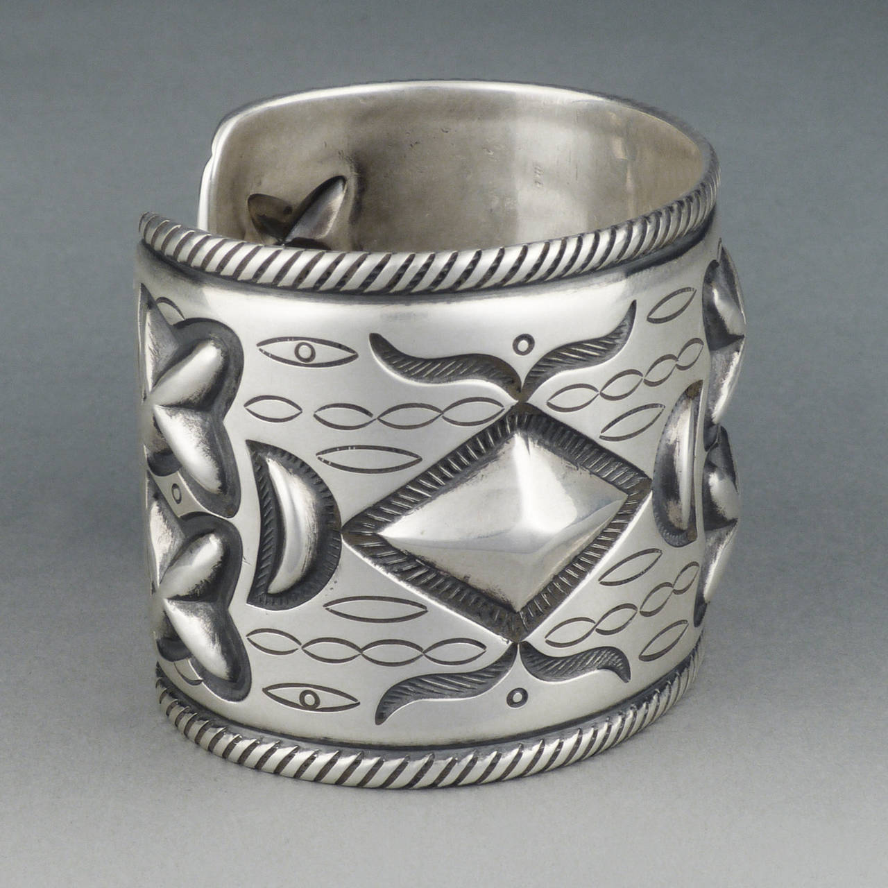 Esteemed Navajo jeweler McKee Platero's work is sought after by collectors the world over. Only creating a few of his brilliant designs a year, owner's of his work hold them among their favorites in their collections! This bracelet is formed of