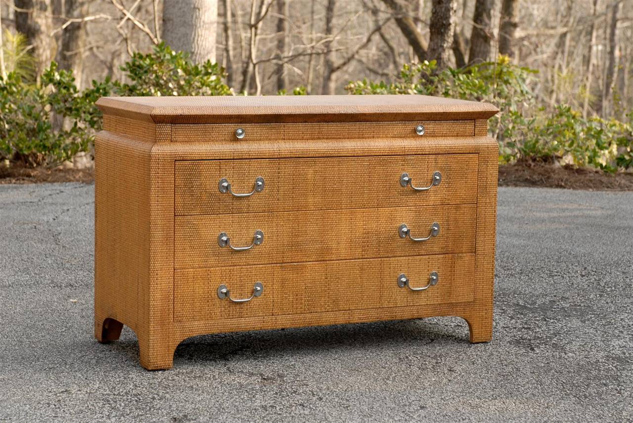 A Stunning raffia three ( 3 ) drawer chest, aged to absolute perfection.  Stout, solid hardwood case construction, drawers in finished mahogany with cast hardware in nickel.  An extremely fine, expertly made piece with no detail overlooked.  A