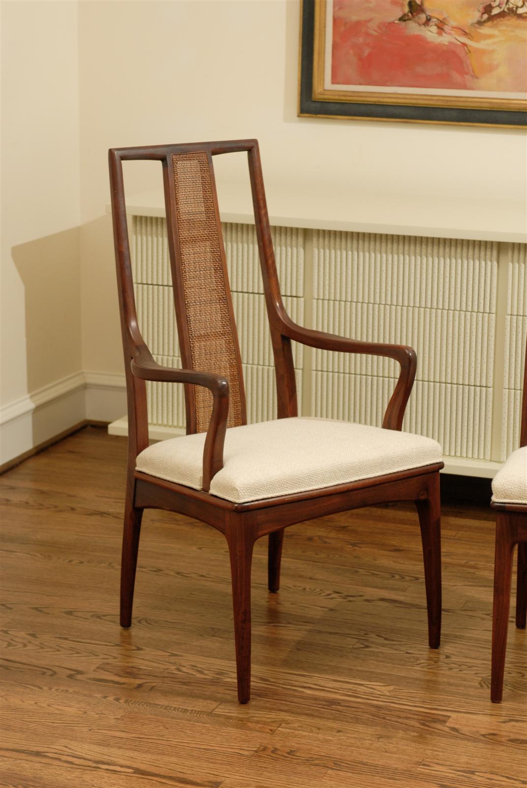 Mid-Century Modern Elegant Set of Six Walnut and Cane Dining Chairs by John Stuart For Sale