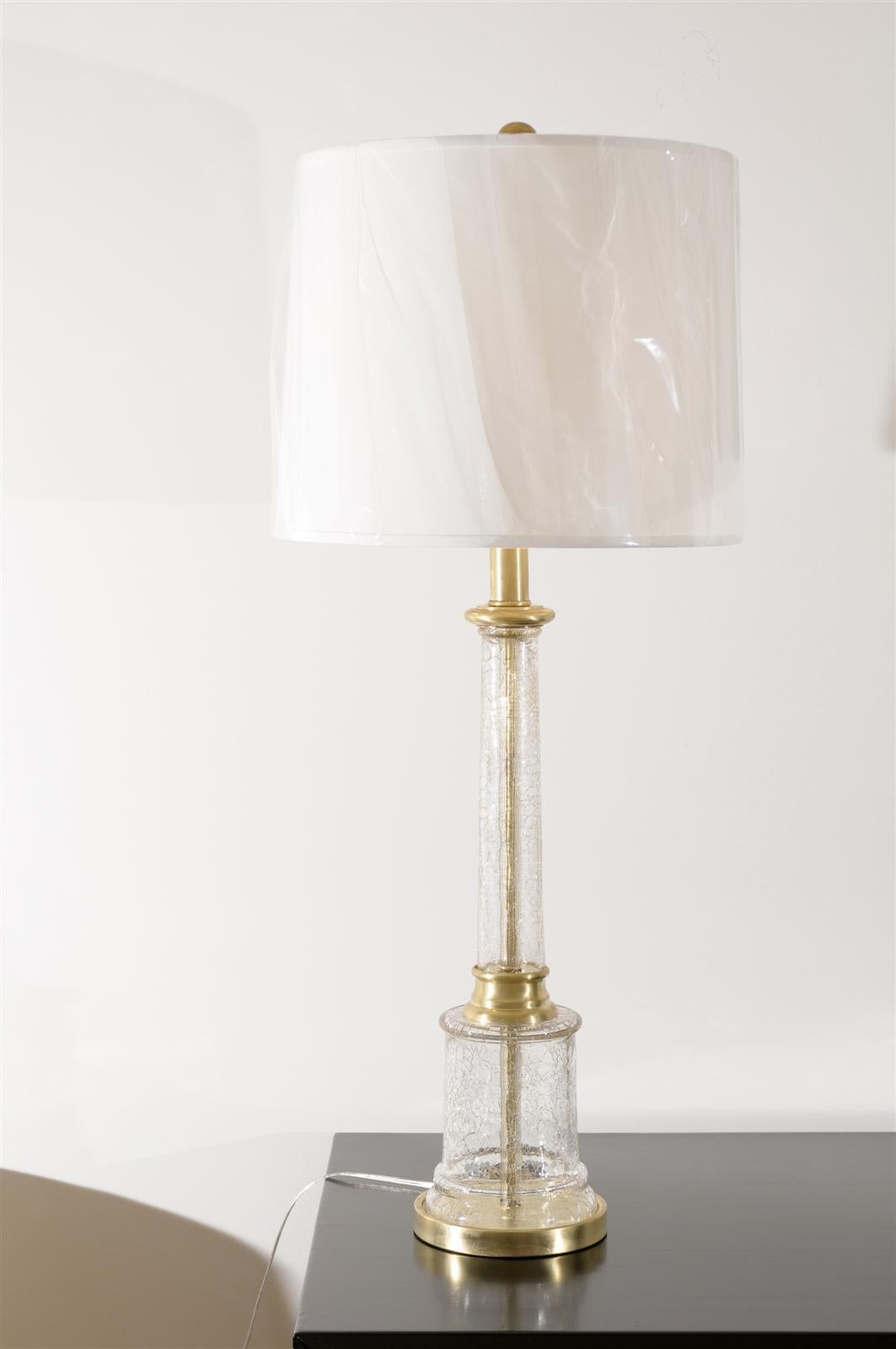 An exceptional pair of vintage crackled glass lamps, circa 1960. Fabulous scale and detail. Thick, substantial glass with beautiful solid brass accents. Exquisite jewelry! Excellent restored condition. The lamps have been re-wired using clear cord