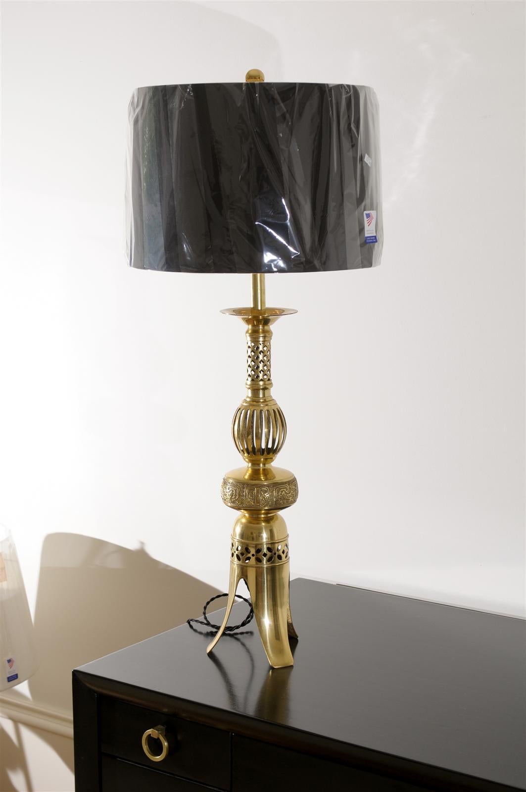 An exceptional pair of large-scale lamps, circa 1960. Solid brass with a sophisticated Asian feel. Beautiful scale and detail, with fabulous patina. Exquisite jewelry! Excellent Restored Condition, rewired with black silk braded cord. Complete with