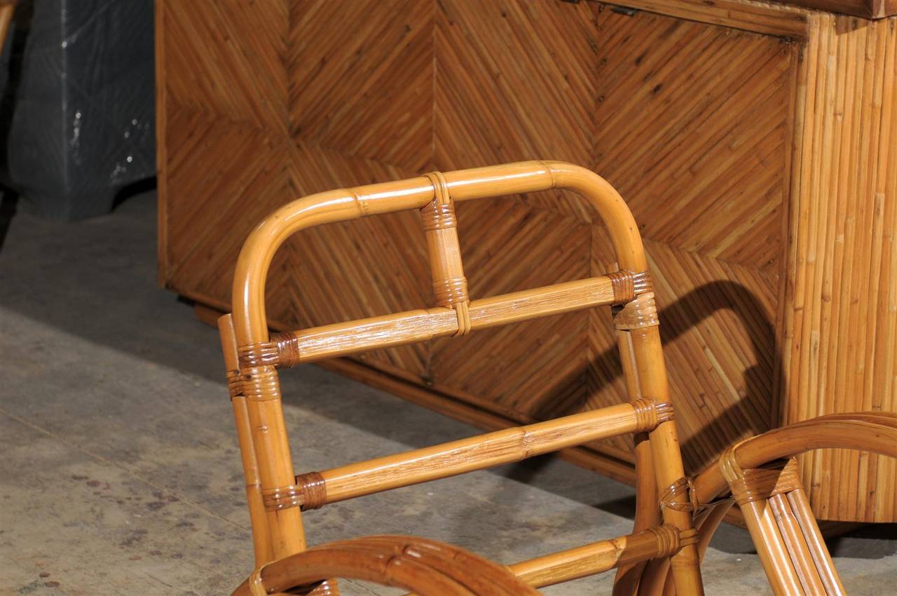 Mid-20th Century Restored Pair of Rattan Pretzel Lounge Chairs in the Style of Paul Frankl