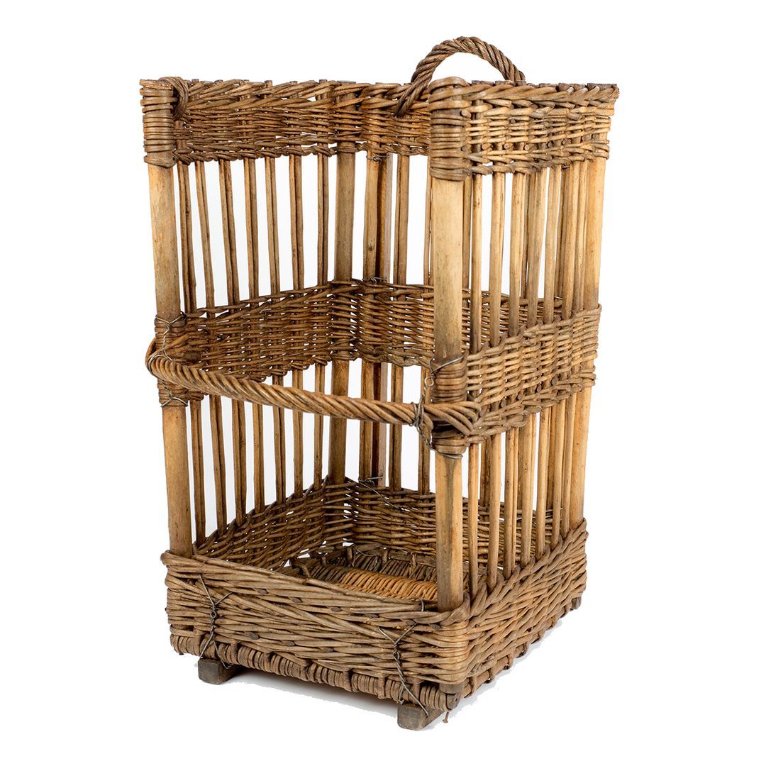 Very large open-sided French baguette basket. Wonderful aged patina. This hard to find willow basket with wooden slat bottom runners for extra support  and a carrying handle was used to showcase freshly baked baguettes in a French boulangerie. A