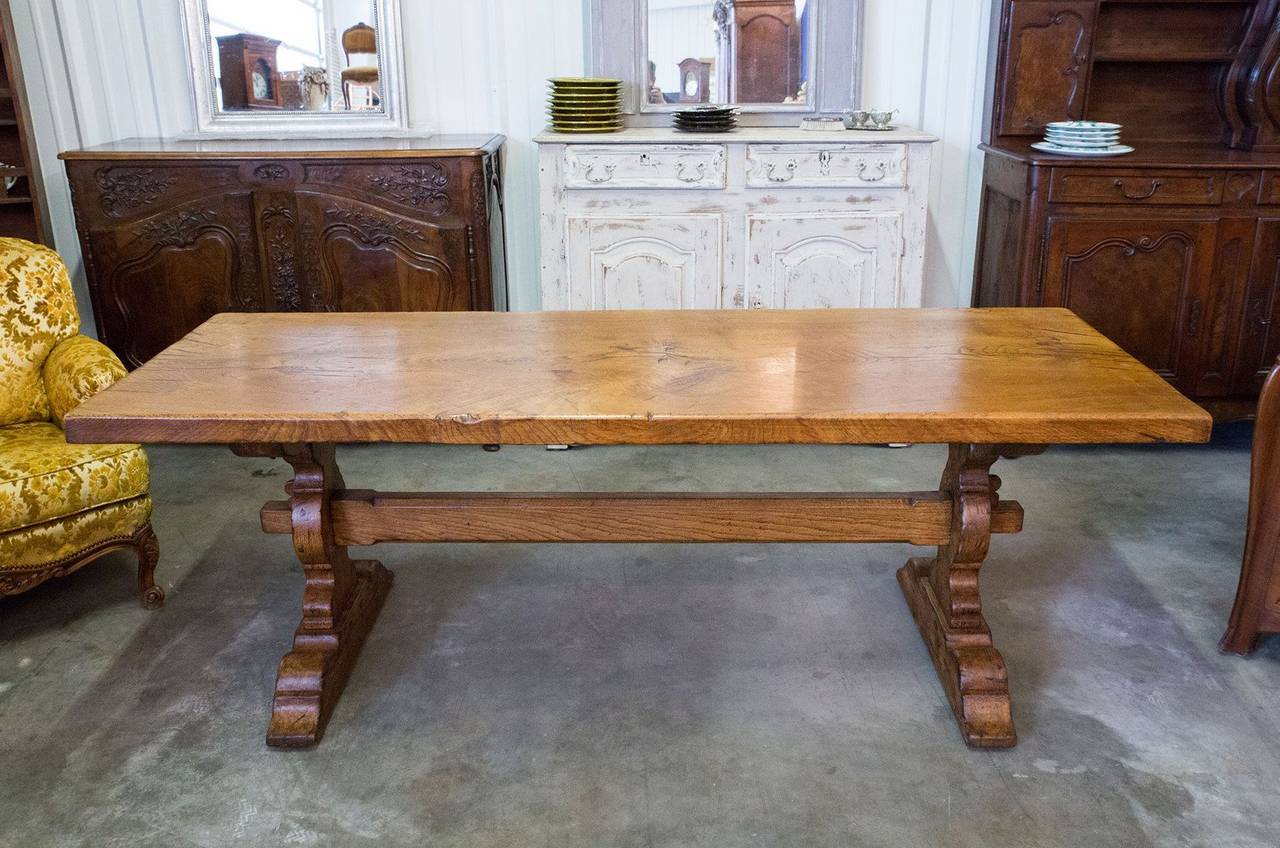 Antique French trestle table. Solid elm with a rich patina and handsome grain pattern. 2.5