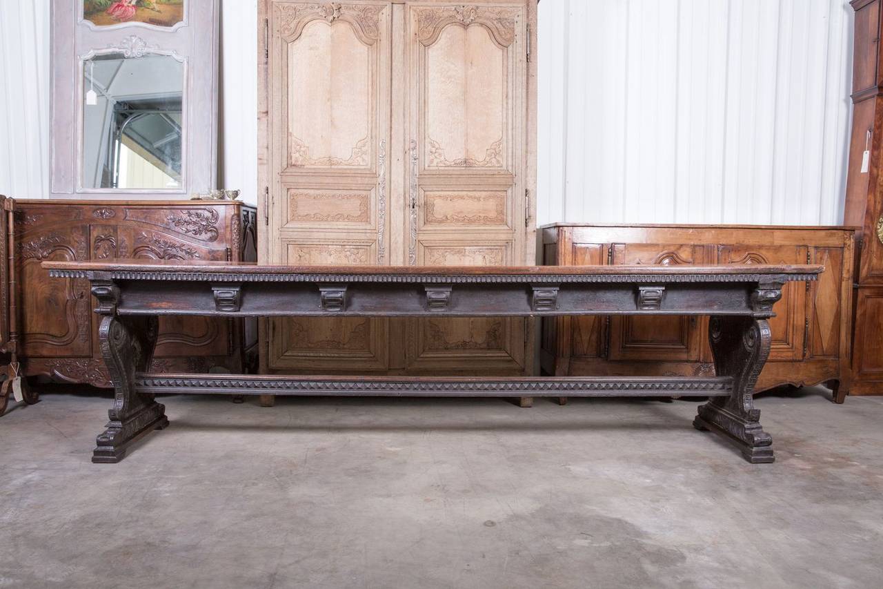 Grand 18th century Renaissance style trestle base center table or console. Handcrafted of solid walnut by talented artisans near Florence, Italy, this rare and monumental table is possibly the most spectacular Renaissance table in our 23-year