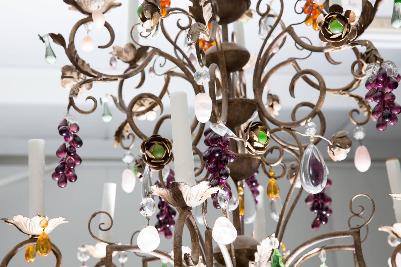 French Louis XV Style Twelve-Light Iron Chandelier with Colored Fruit Shaped Crystals