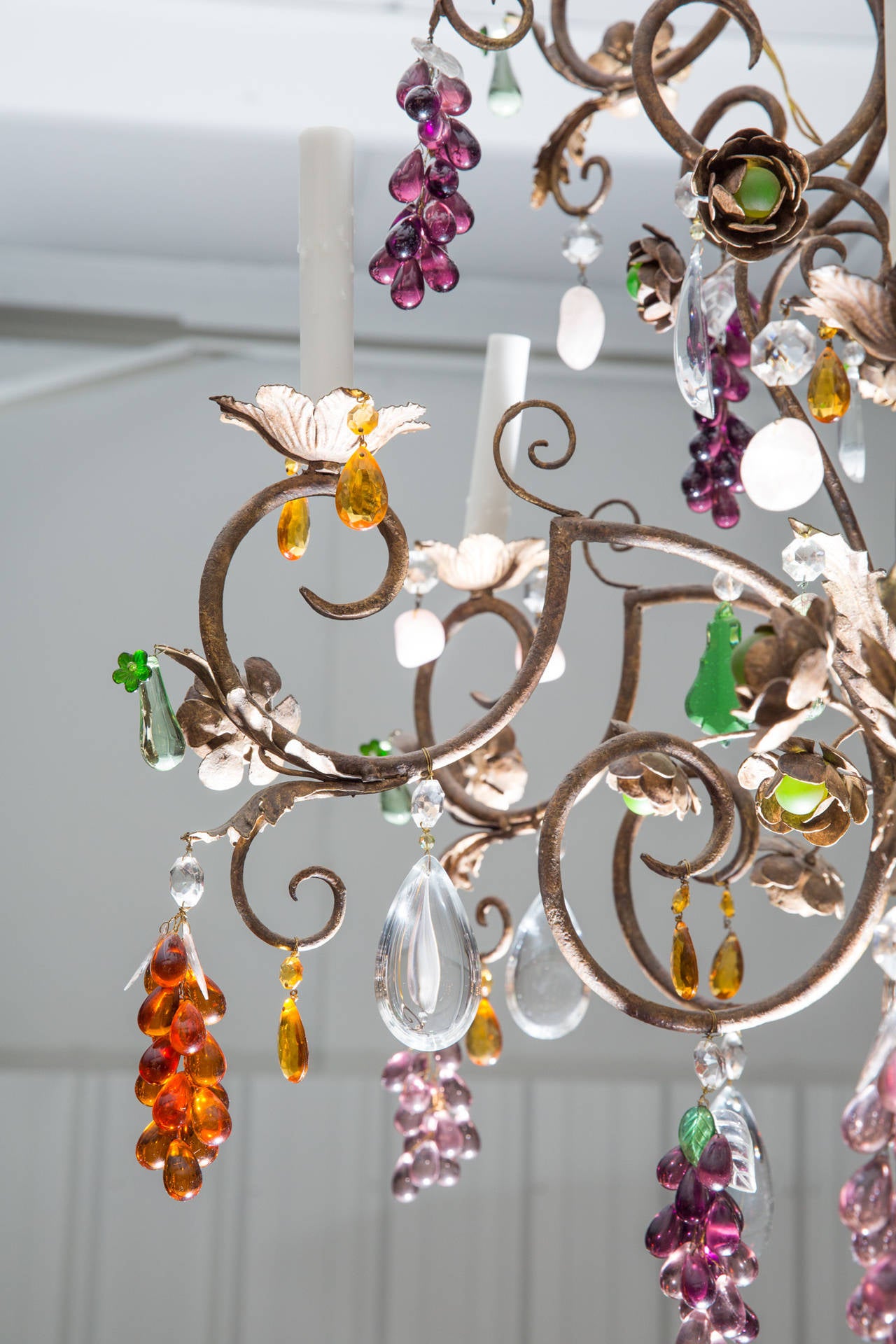 20th Century Louis XV Style Twelve-Light Iron Chandelier with Colored Fruit Shaped Crystals
