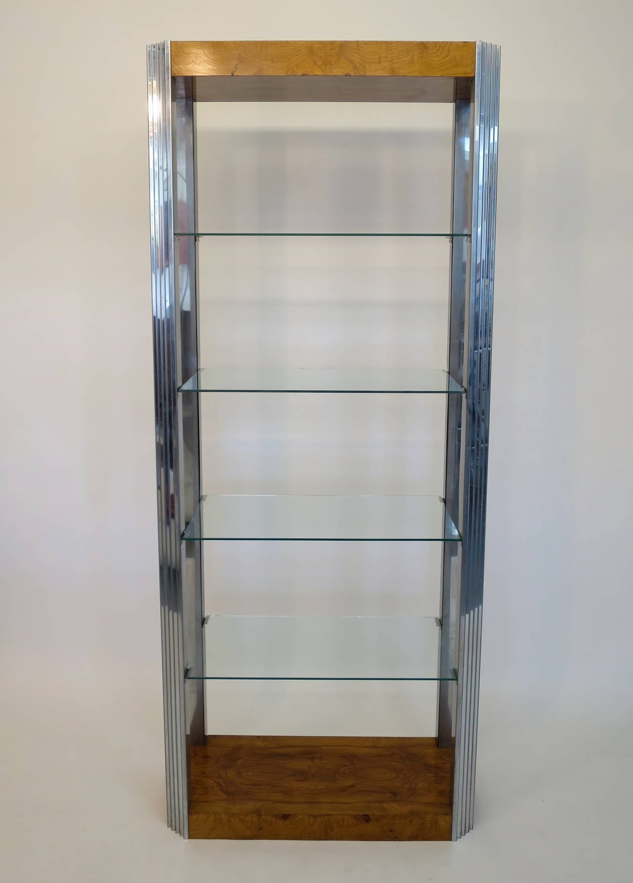 Milo Baughman burl wood and chrome etagere with four glass shelves. Manufactured by Thayer Coggin, circa 1970s.