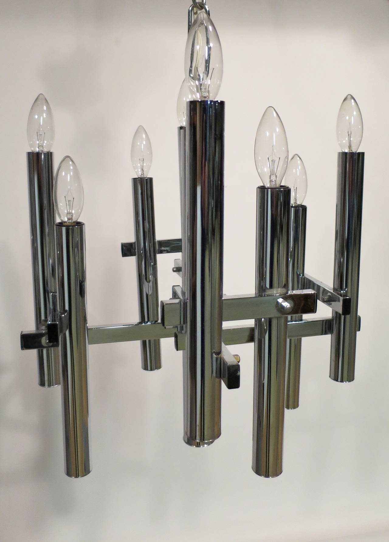 Pair of Modern 1970's Chrome Chandeliers.  Very nice original condition.  Measure 17