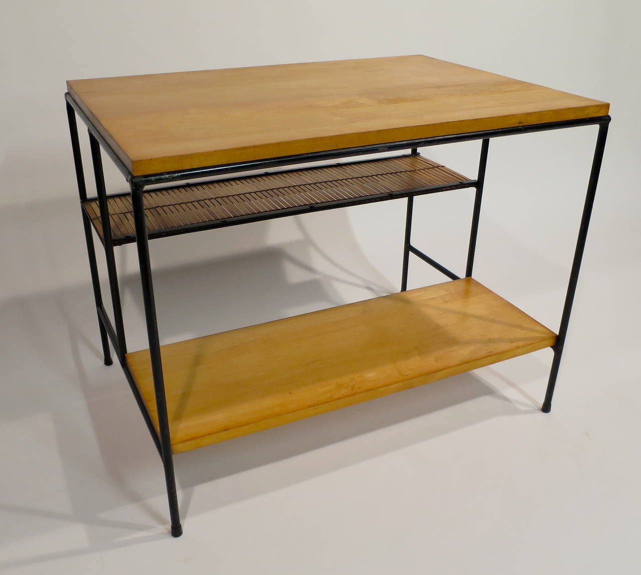 Paul McCobb 'Planner Group' Three-Tier Iron and Wood Table.  Circa 1950's.