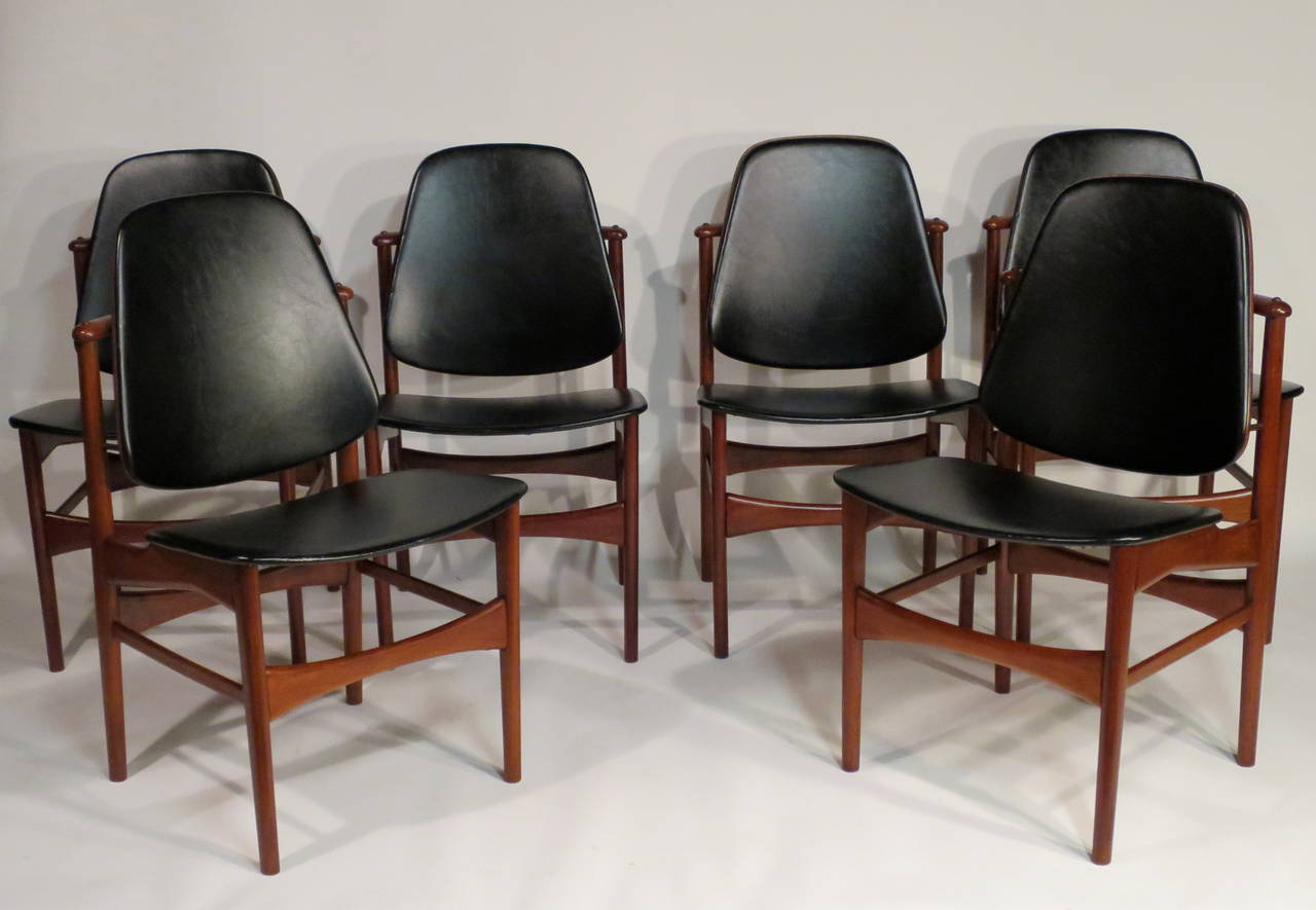 Exceptional set of six chairs by Arne Hovmand-Olsen for Onsild Furniture. Chairs are in very nice condition with newly upholstered seats and backs. Made in Denmark, circa 1950s.