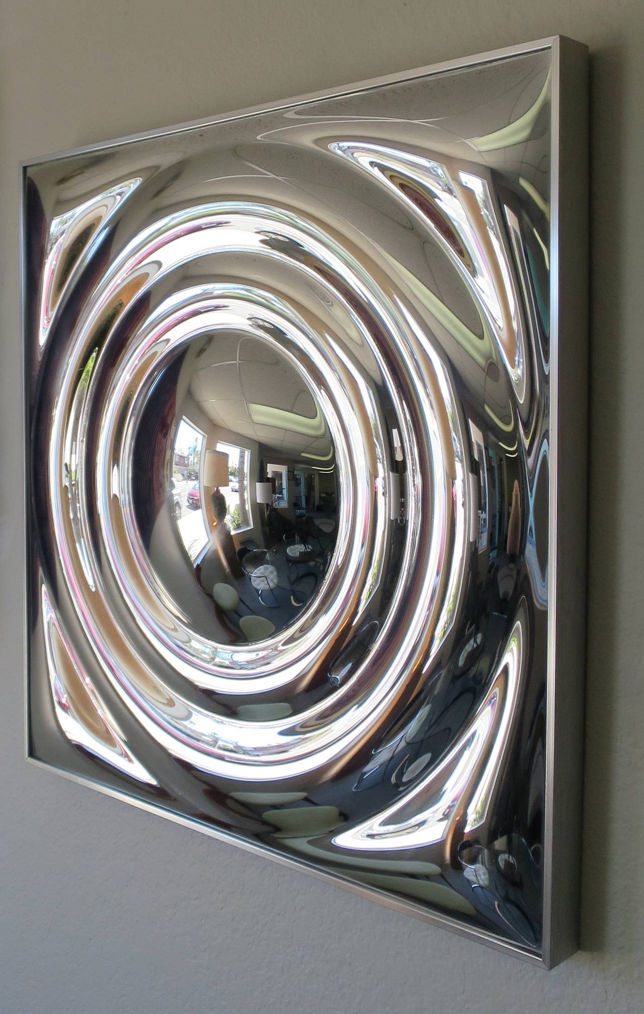 'Saturn Ring' Op Art wall mirror by Tuner. Overall very nice condition with very minimal wear consistent with age, circa 1970s.
