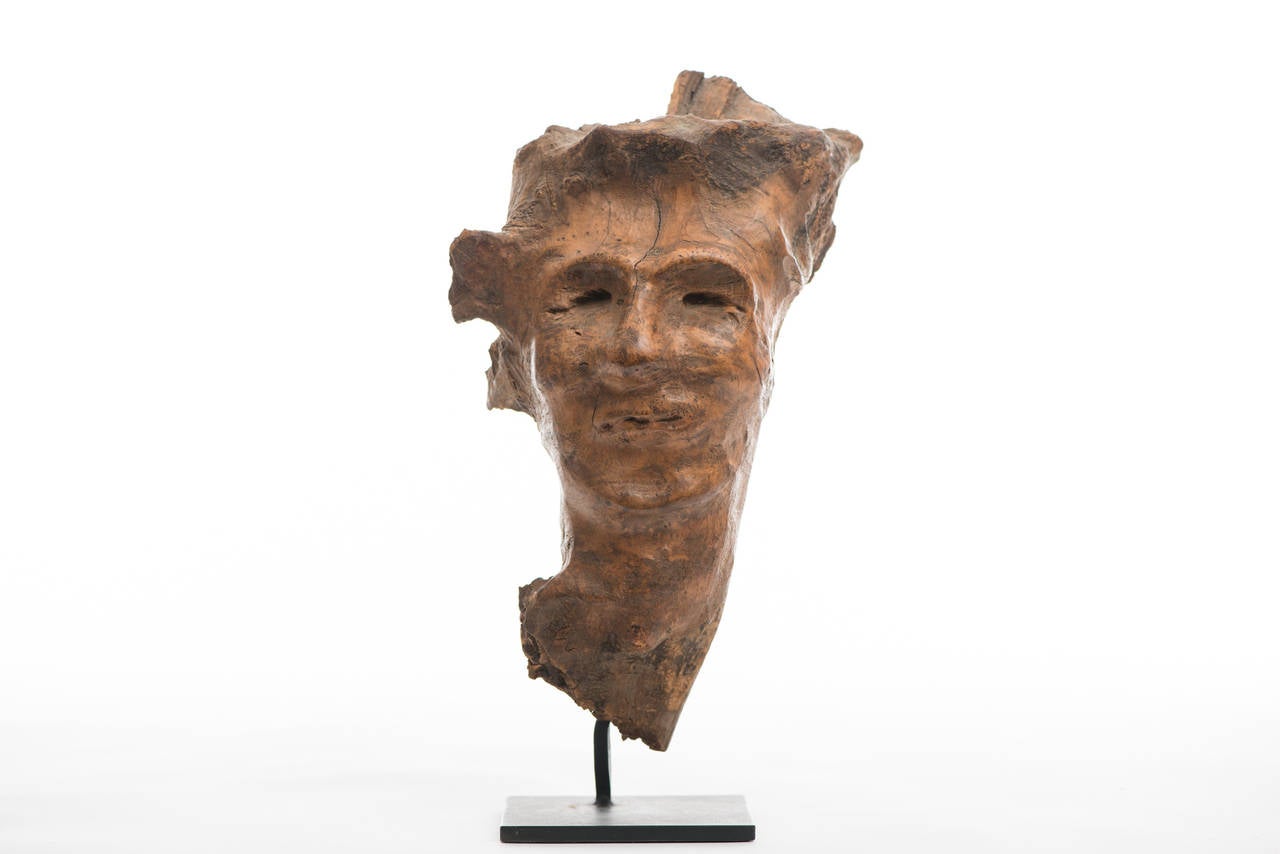 Burl wood face carving

region / Tribe: Northeast,

circa late 19th-early 20th century.

Material: Ash Burl.

Dimension: H 12” x W 7 1/2” x L 6”.

Condition: Excellent, no restoration.

Collection History: Chuck Auerbach, Akron,