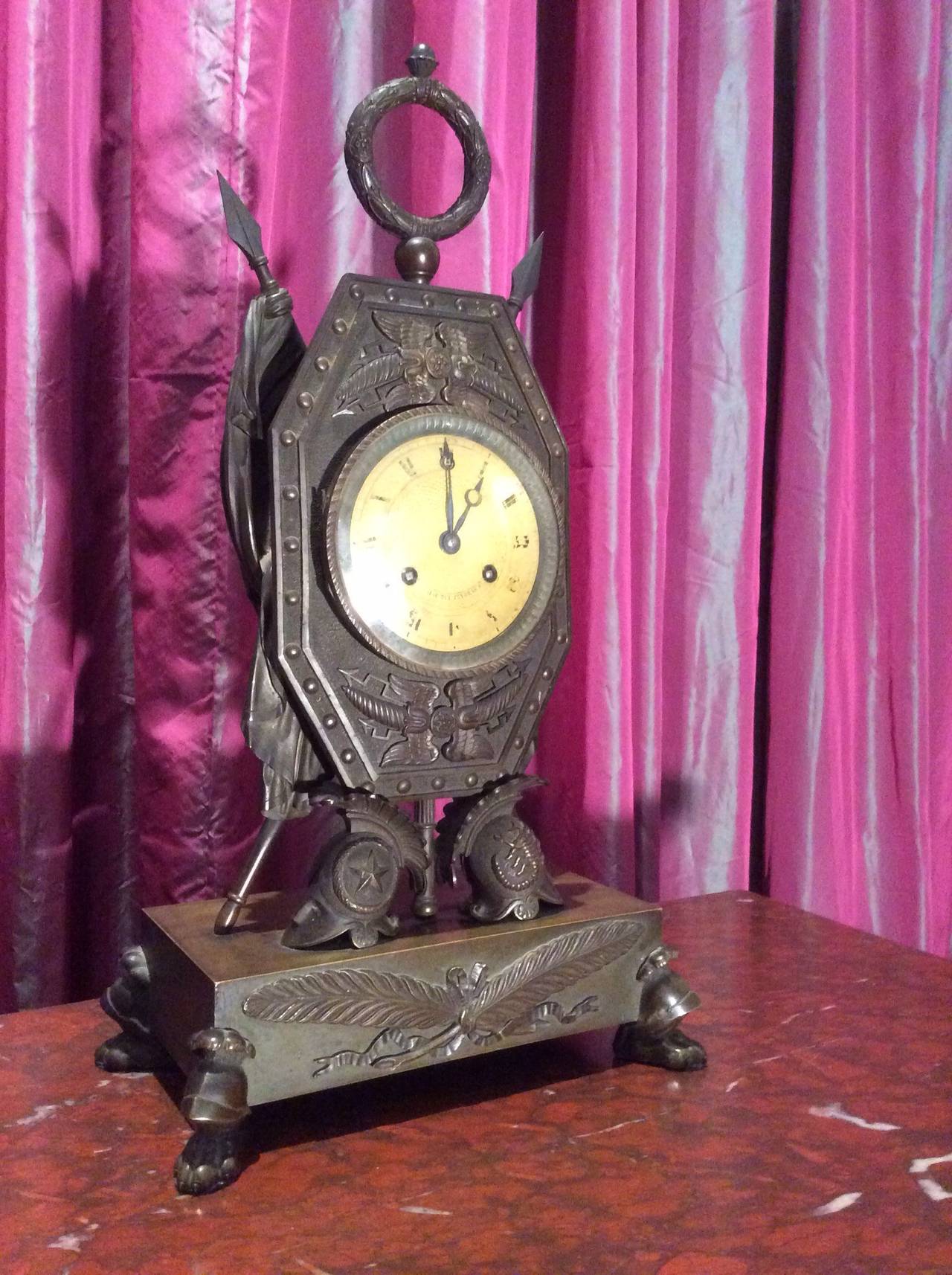 Empire Clock with Warlike Attributes