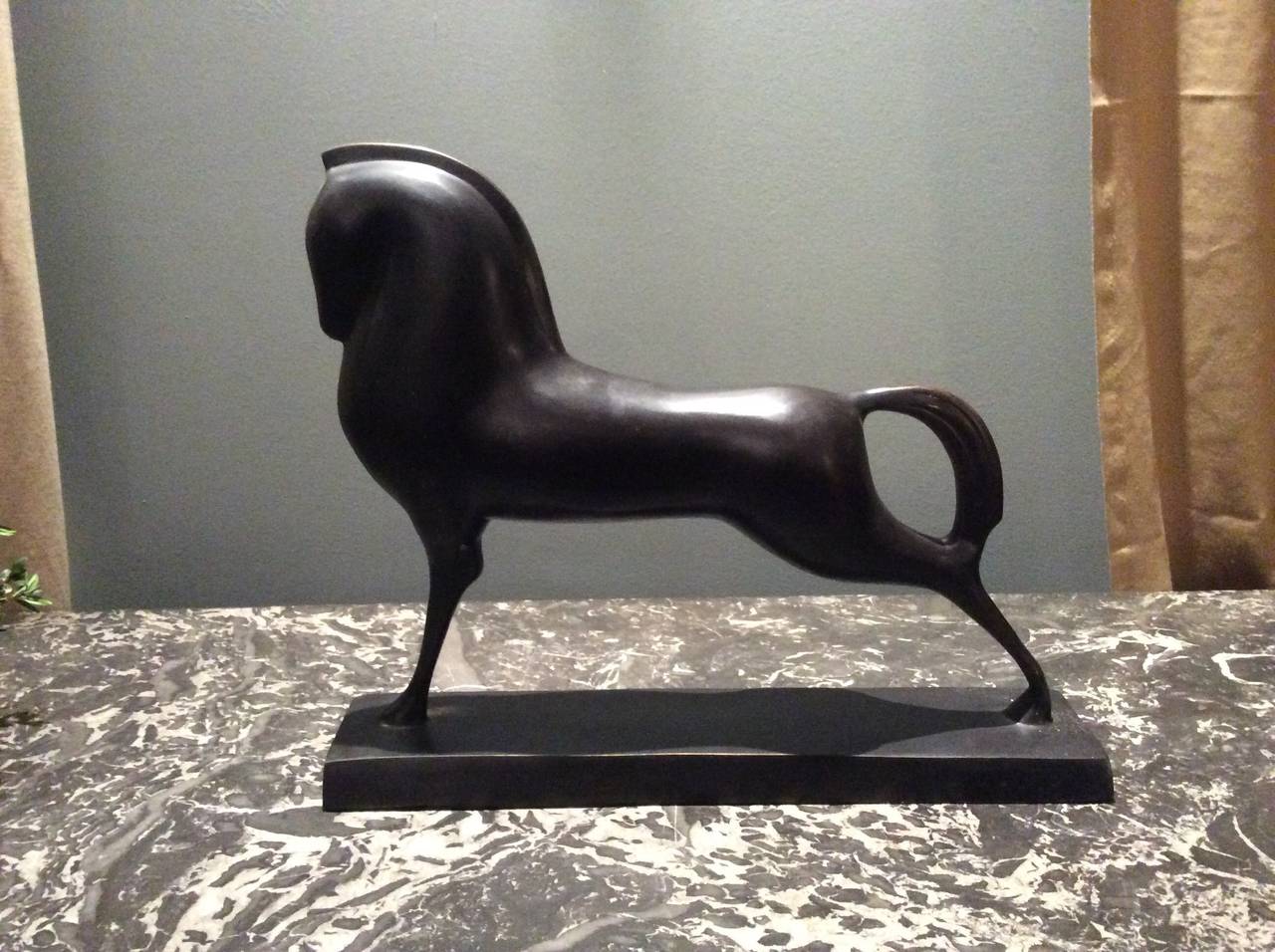 Very decorative etruscan horse in black patinated bronze.