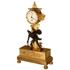 Rare Empire Period Clock in Engraved Gilt and Patinated Bronze