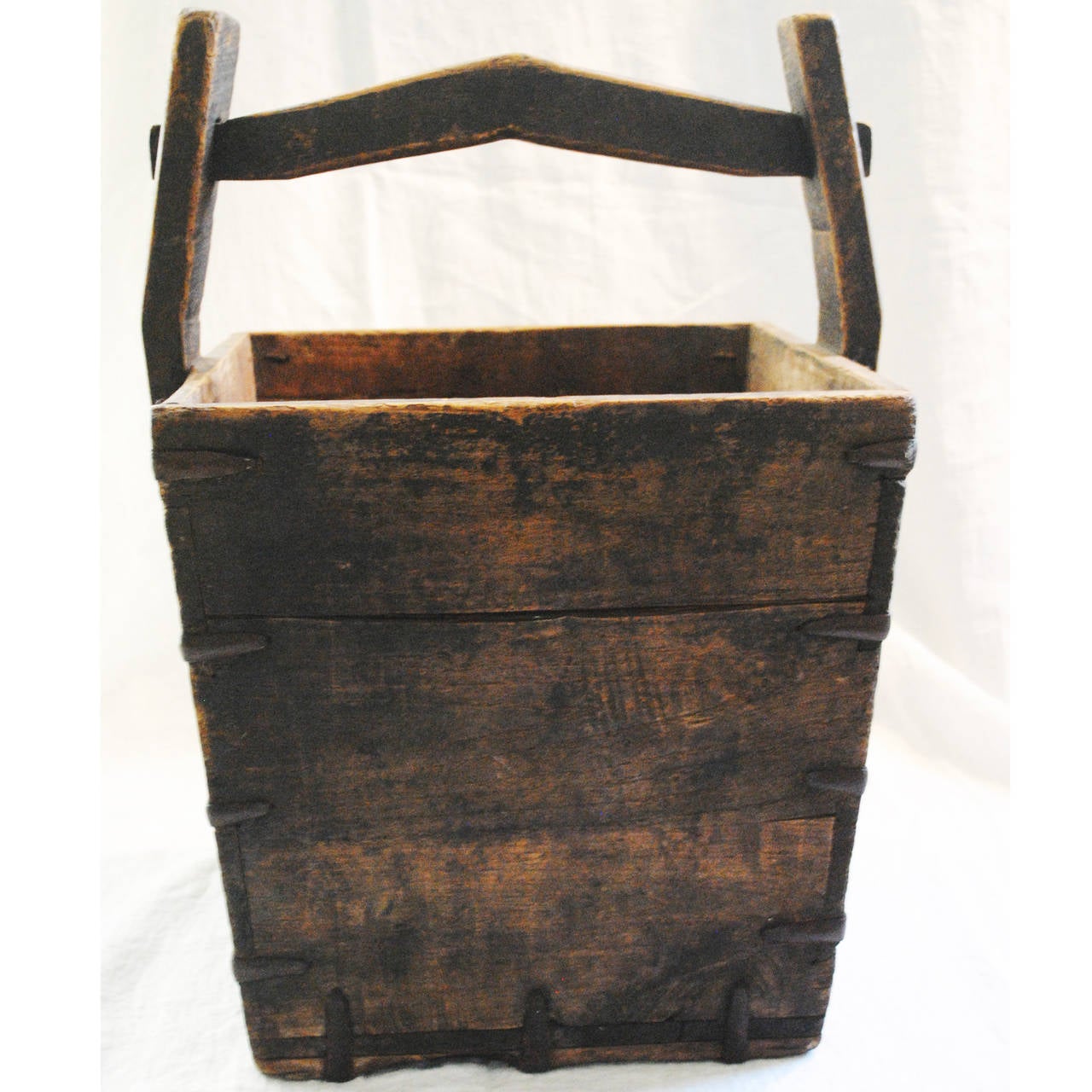 This antique carrier was used for transporting rice from fields in China for generations. Measure: 14 1/4