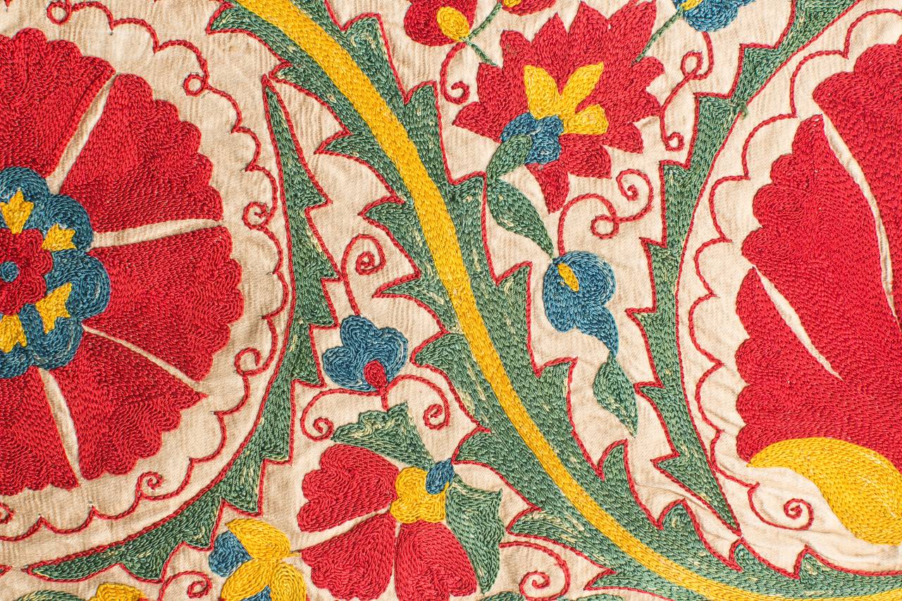 Suzanis are some of the most classically beautiful embroidered pieces in the world. The word Suzani directly translates to “needlework,” but to those who truly appreciate their beauty and value, it means much more. The best and most authentic
