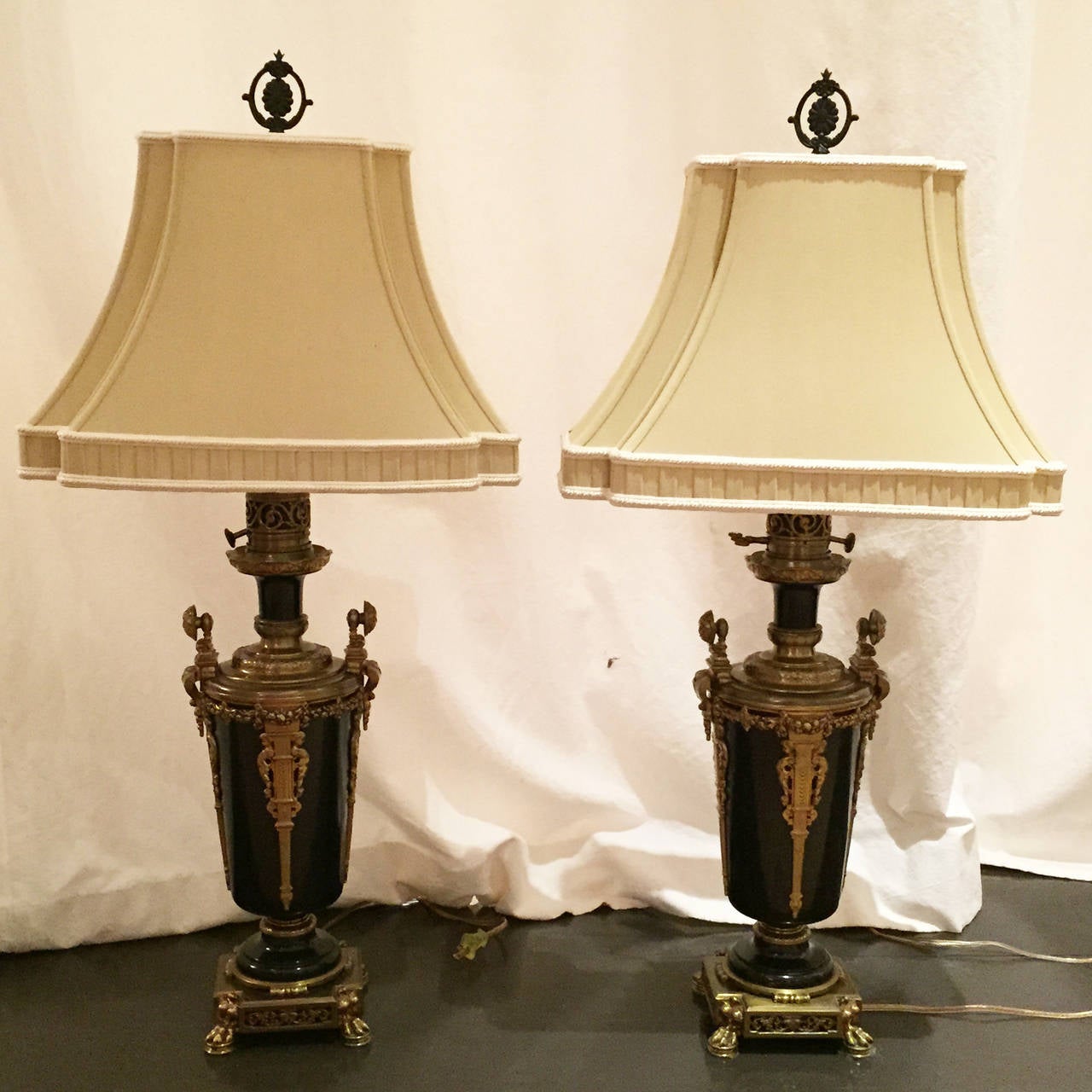 Pair of Bronze and Black French Urn Lamps
