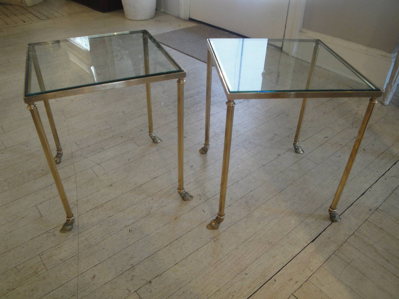 Pair of Mid-Century French tables in brass with hoofed feet and 1/2