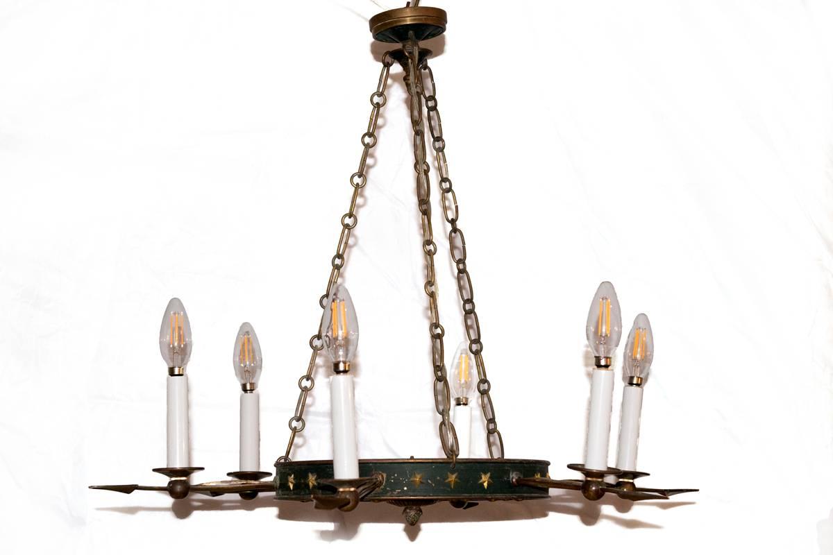 A pair of tole and bronze painted chandeliers. Wired for US. Will sell separately.