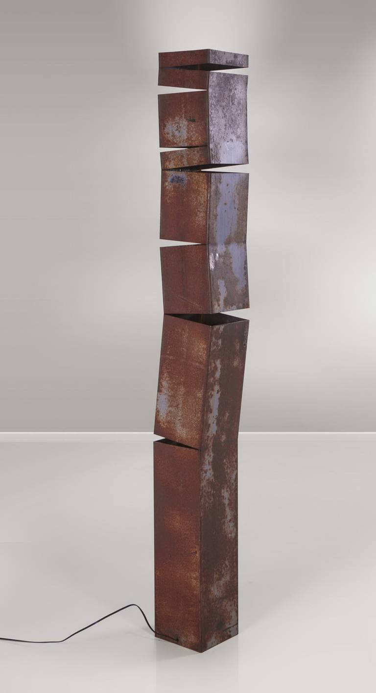 Cut and rusted iron floor lamp, designed by Jacques Mizrahi, produced by Atelier A, France, 1971.
Documents provided.
Free shipping to London.