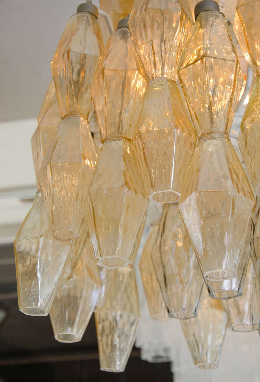 Polyhedral chandelier, glasses designed by Carlo Scarpa, manufactured by Venini, color: amber. Prod Italy, Murano 1950. (Height adjustable)
Free shipping to London.