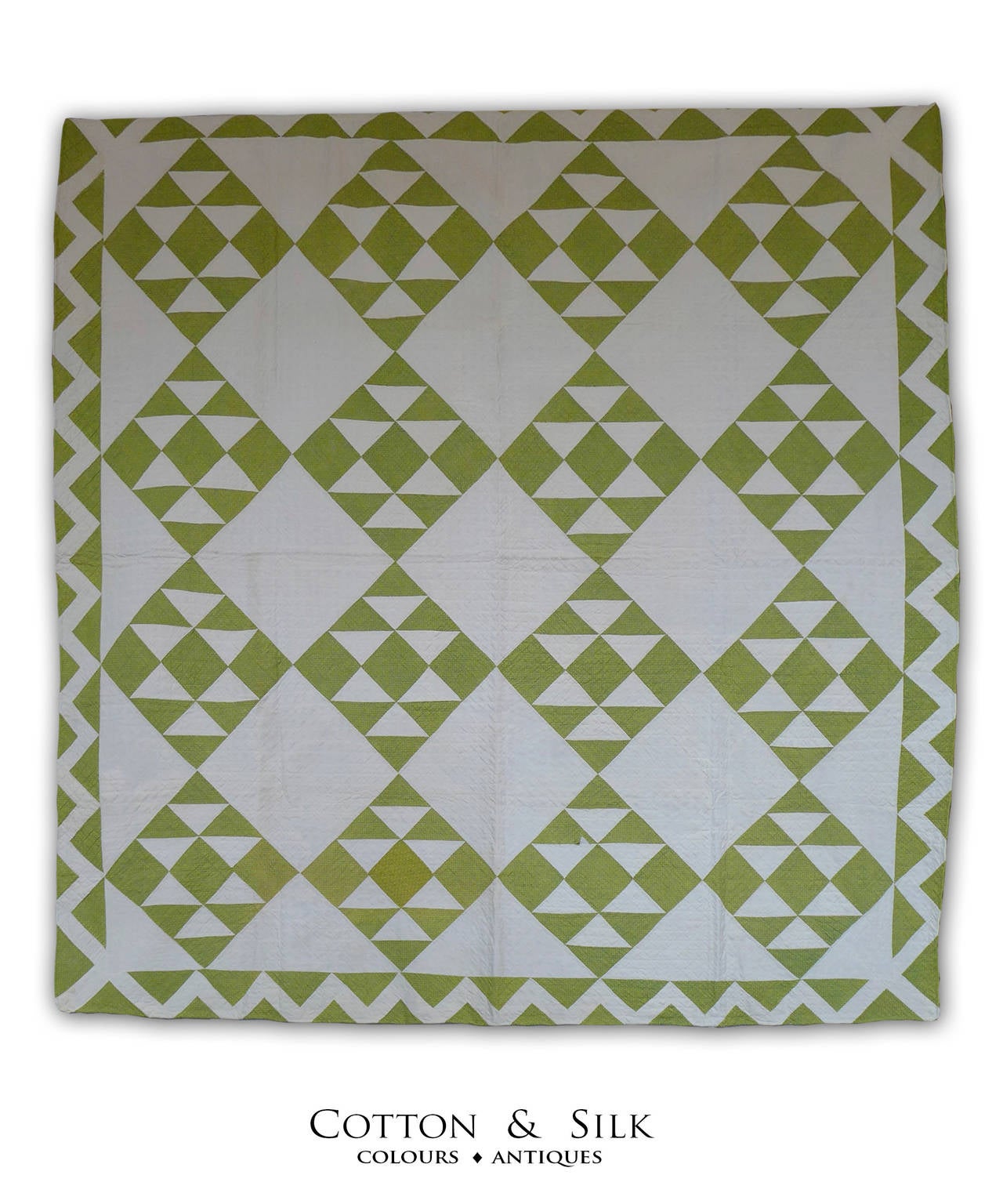 The soft lime green of this antique pattern is not a color ,but nature itself  in
the green of ferns in spring and the leaves of a tulip.
Perhaps the colors of Pennsylvania in 1880 where this quilt was made..,