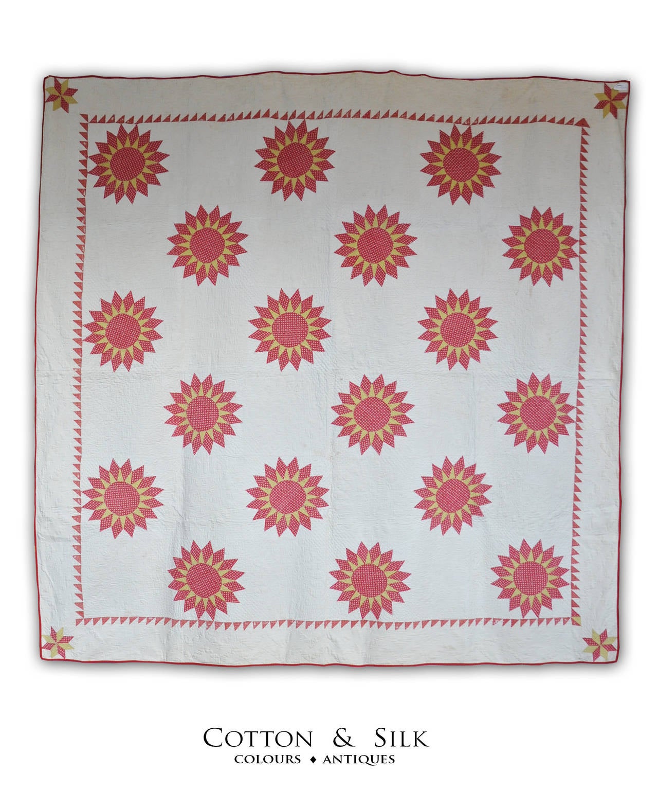 Sunburst Stars in red and yellow on the white background .
The Saw -Tooth is a elegant border for this magnificent quilt.