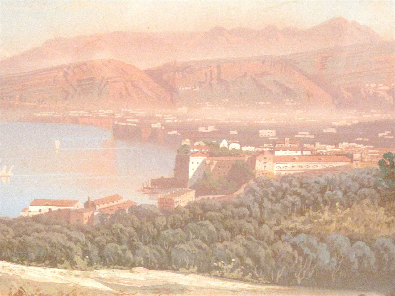 A luminous Italian gouache panoramic view of the Bay of Naples, late 19th century, signed illegibly at the lower right. Vesuvius can be seen in the distance at the upper left.