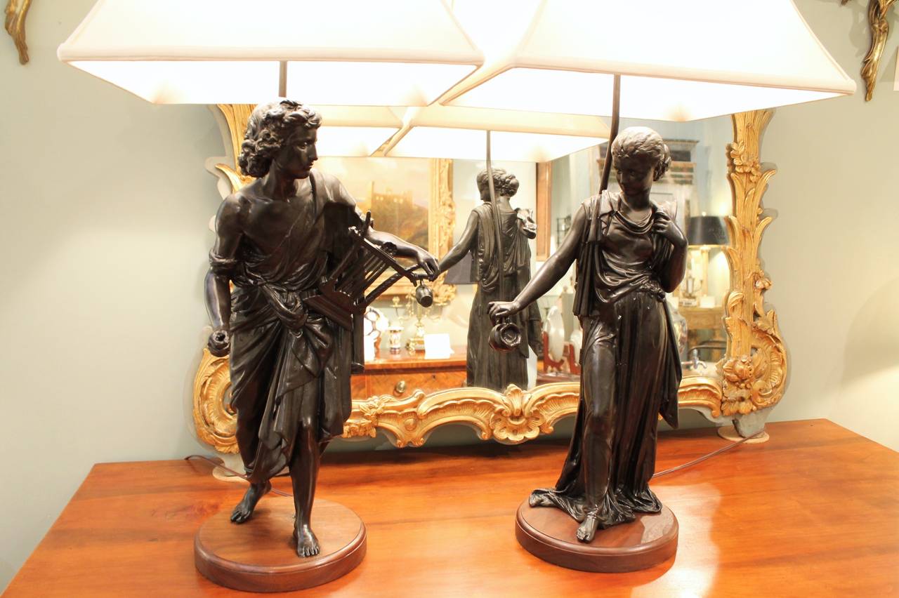 Neoclassical Pair of French Figural Lamps on Walnut Plinths For Sale