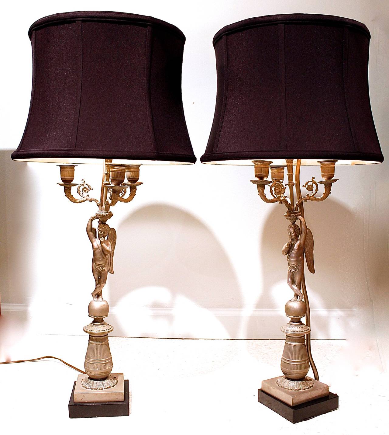 Pair of Continental Pewter Winged Putto Figural Candelabras as Lamps