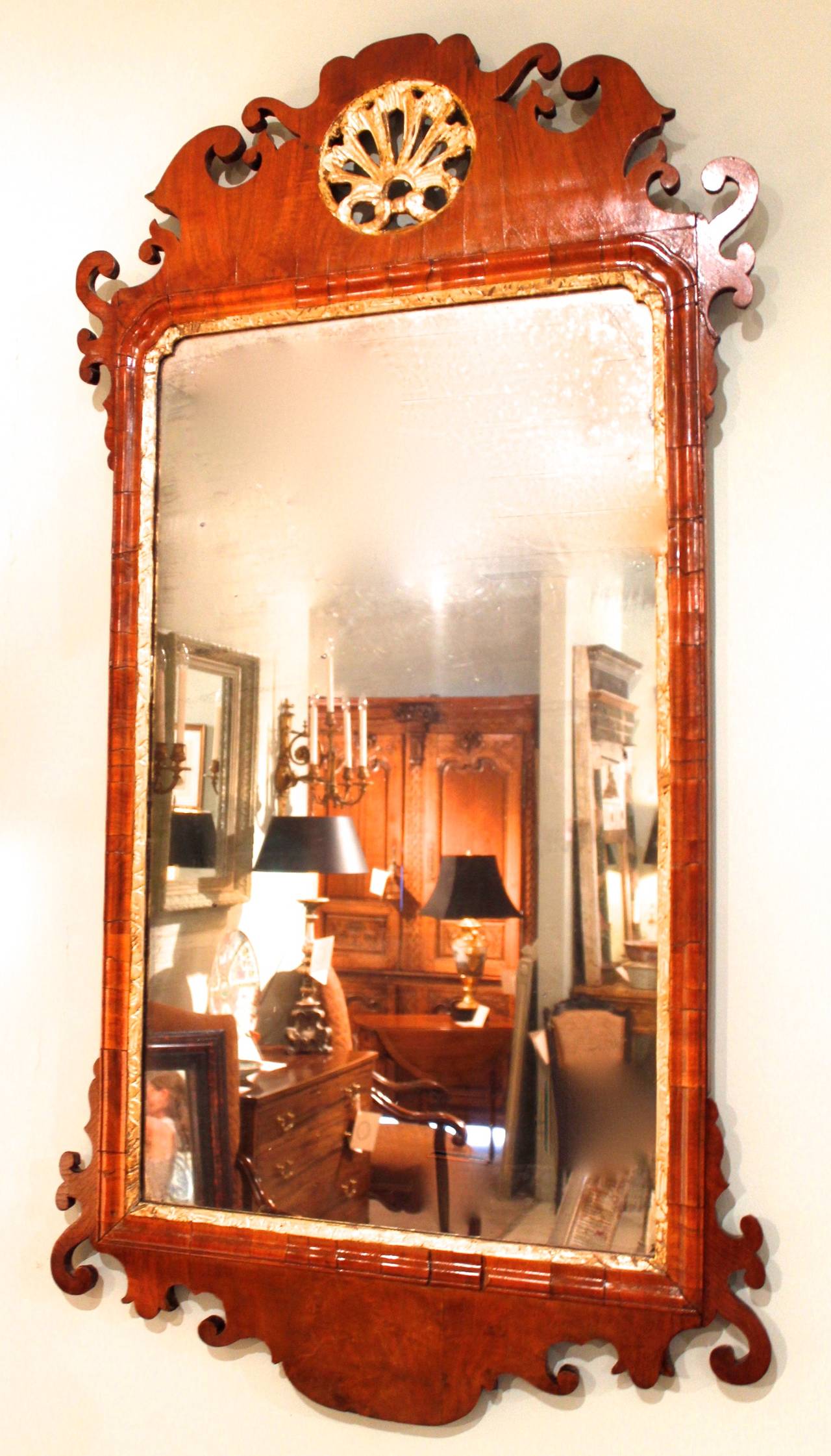 George II Walnut and Parcel-Gilt Mirror