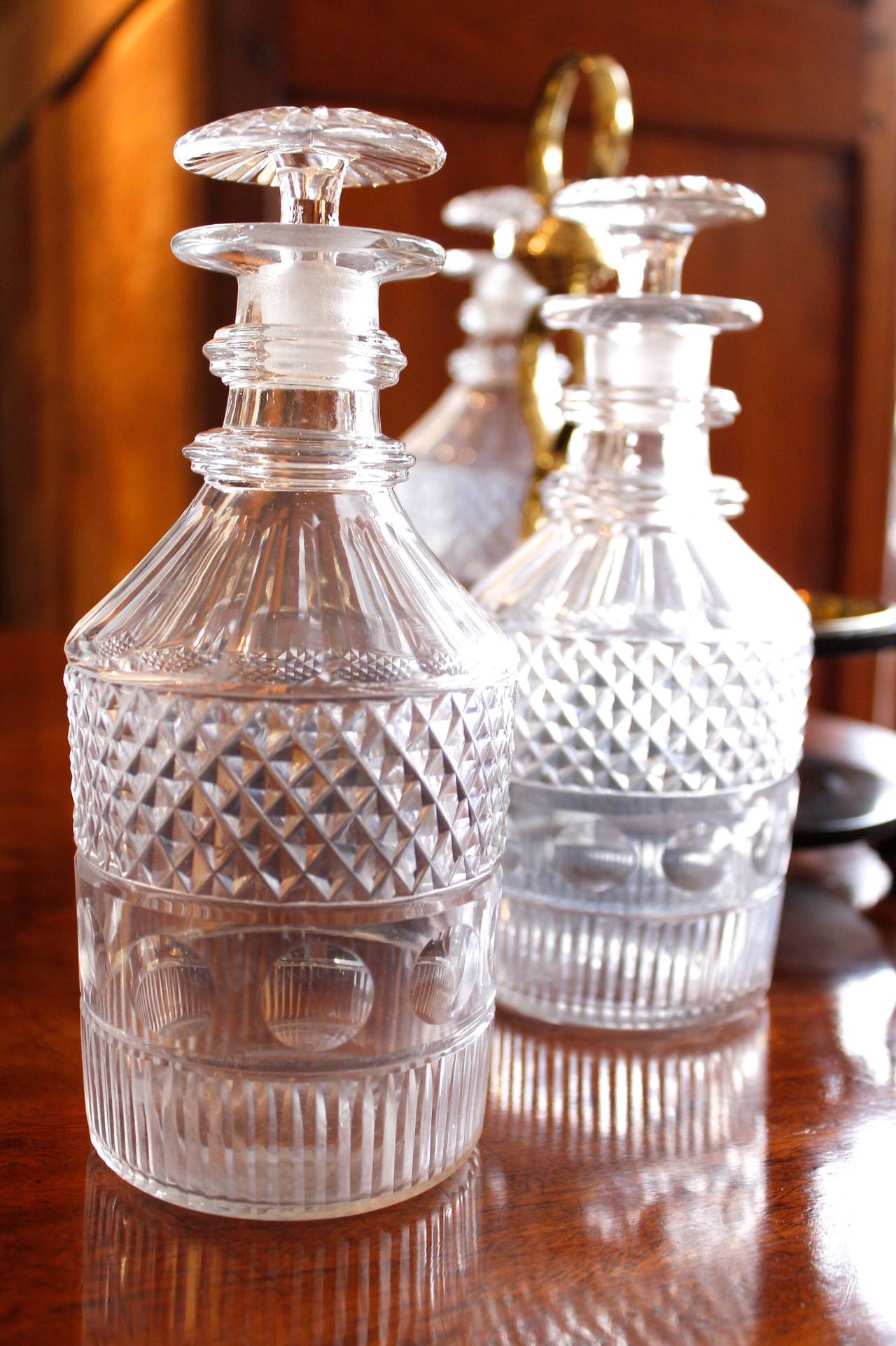 19th Century Set of Three Georgian Decanters with a Brass and Lacquer Caddy For Sale