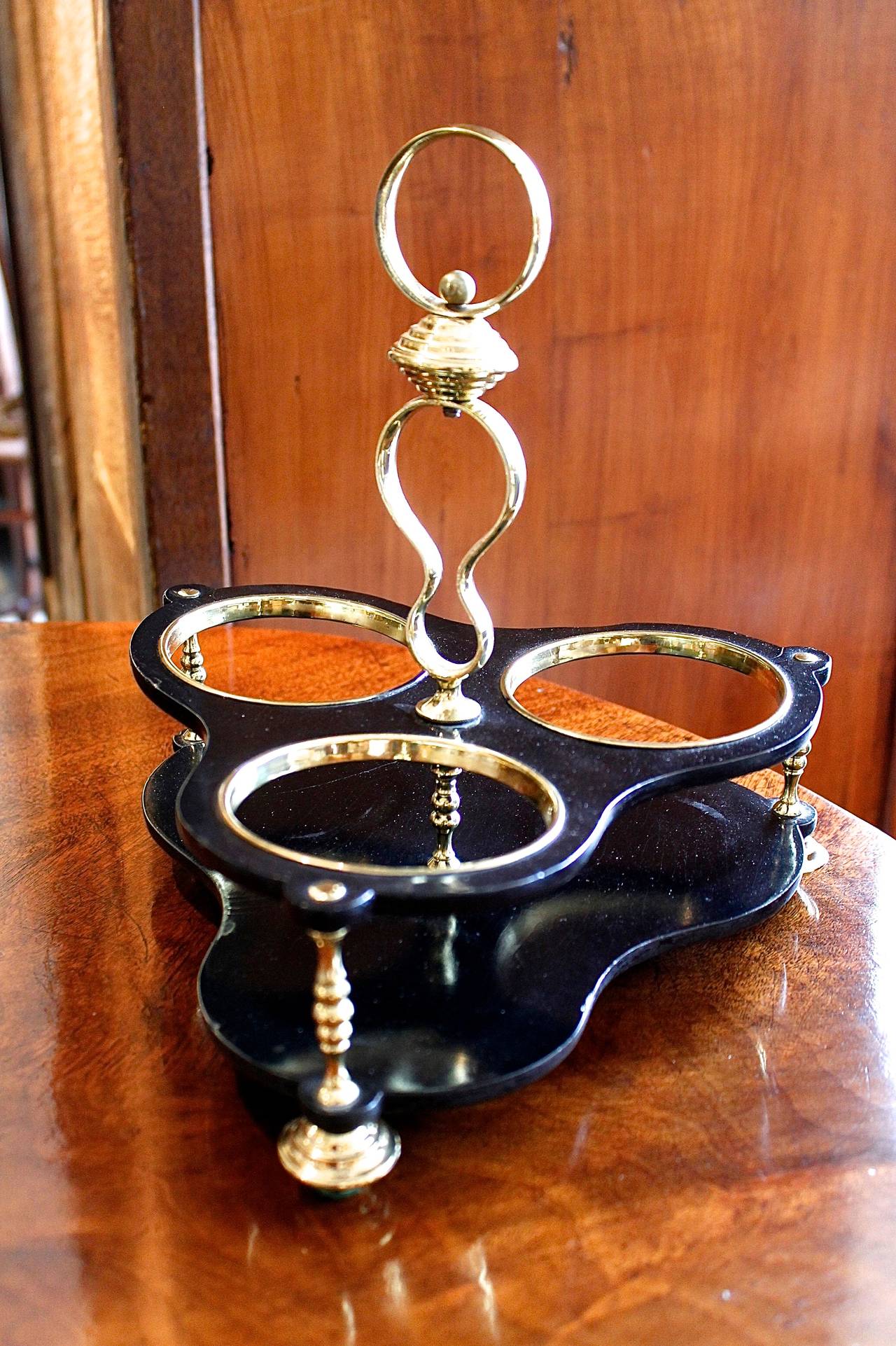 English Set of Three Georgian Decanters with a Brass and Lacquer Caddy For Sale