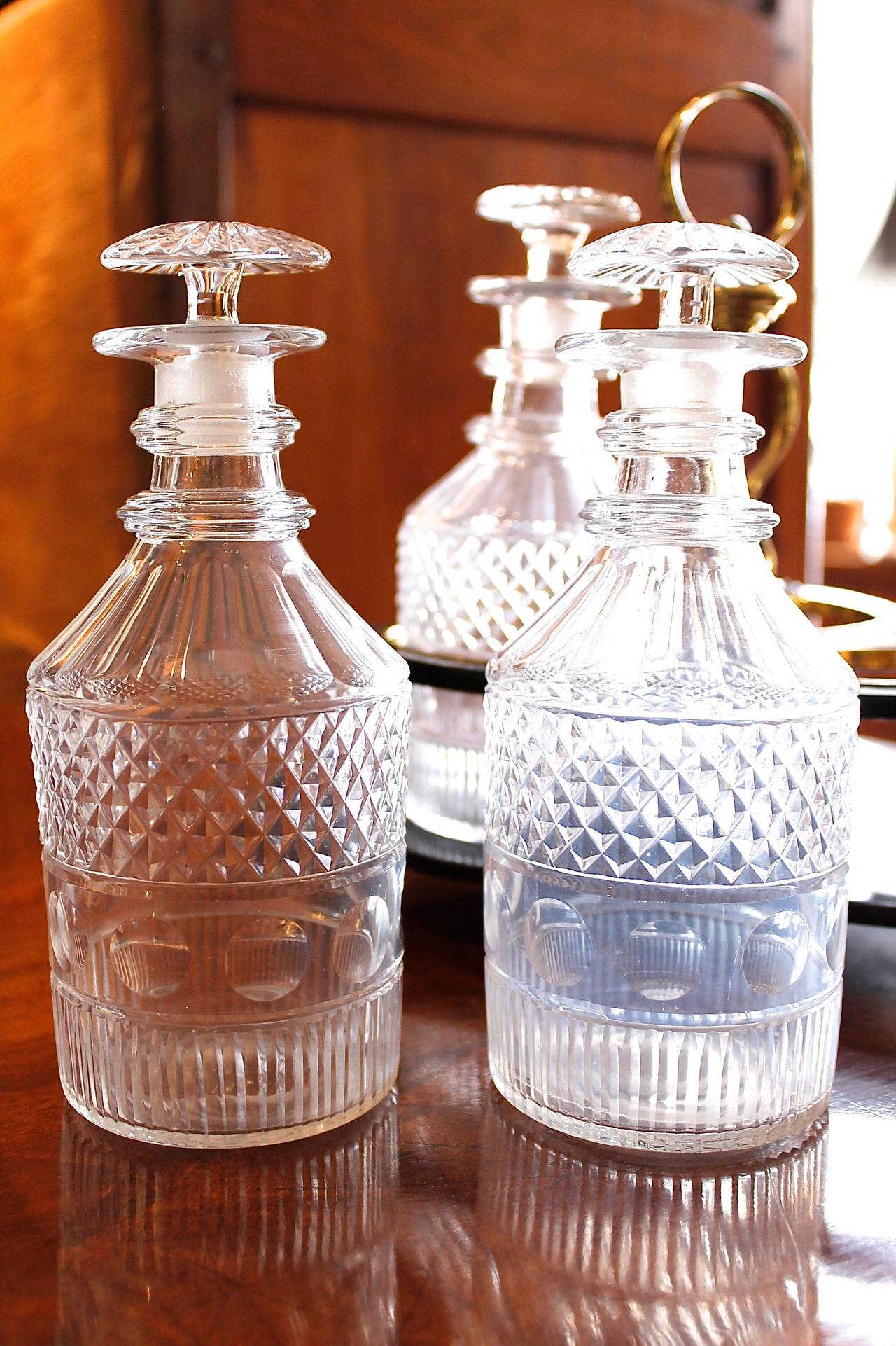 Set of Three Georgian Decanters with a Brass and Lacquer Caddy For Sale 1