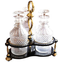 Set of Three Georgian Decanters with a Brass and Lacquer Caddy