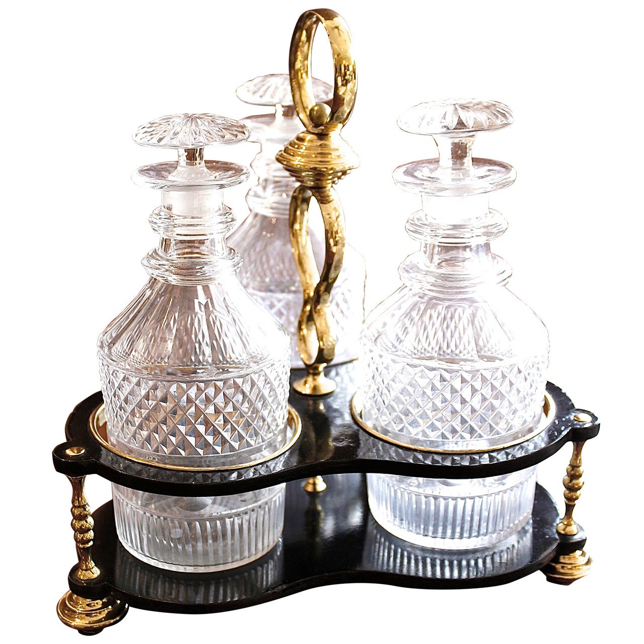 Set of Three Georgian Decanters with a Brass and Lacquer Caddy For Sale
