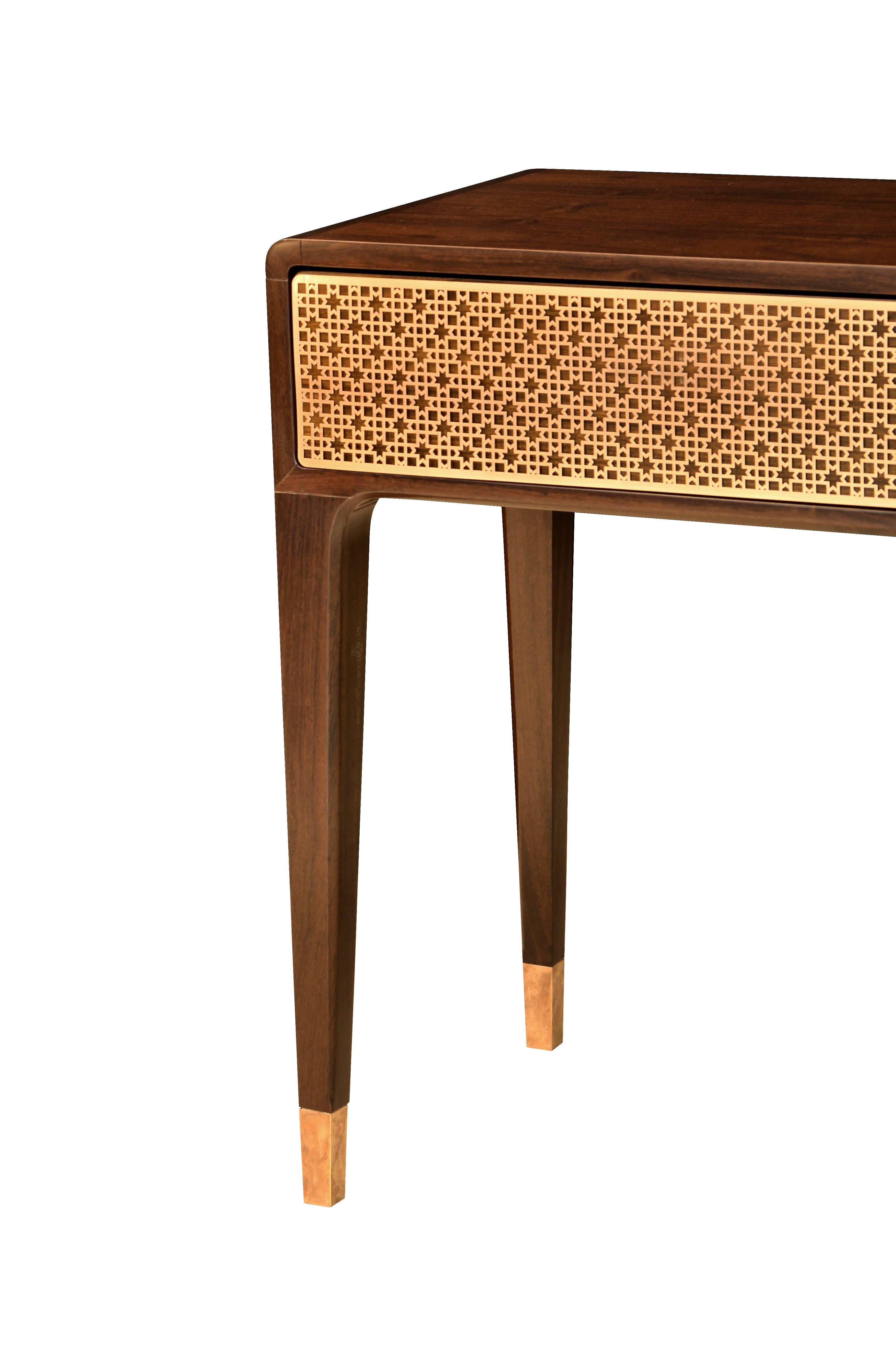 This console table is made with front drawers in laser cut brass plate with customizable patterns (Arabic, deco or customized). Brass in copper, polished, dark or light finishing.

Legs in solid wood, veneered or lacquer.

Finishing: Polyurethane