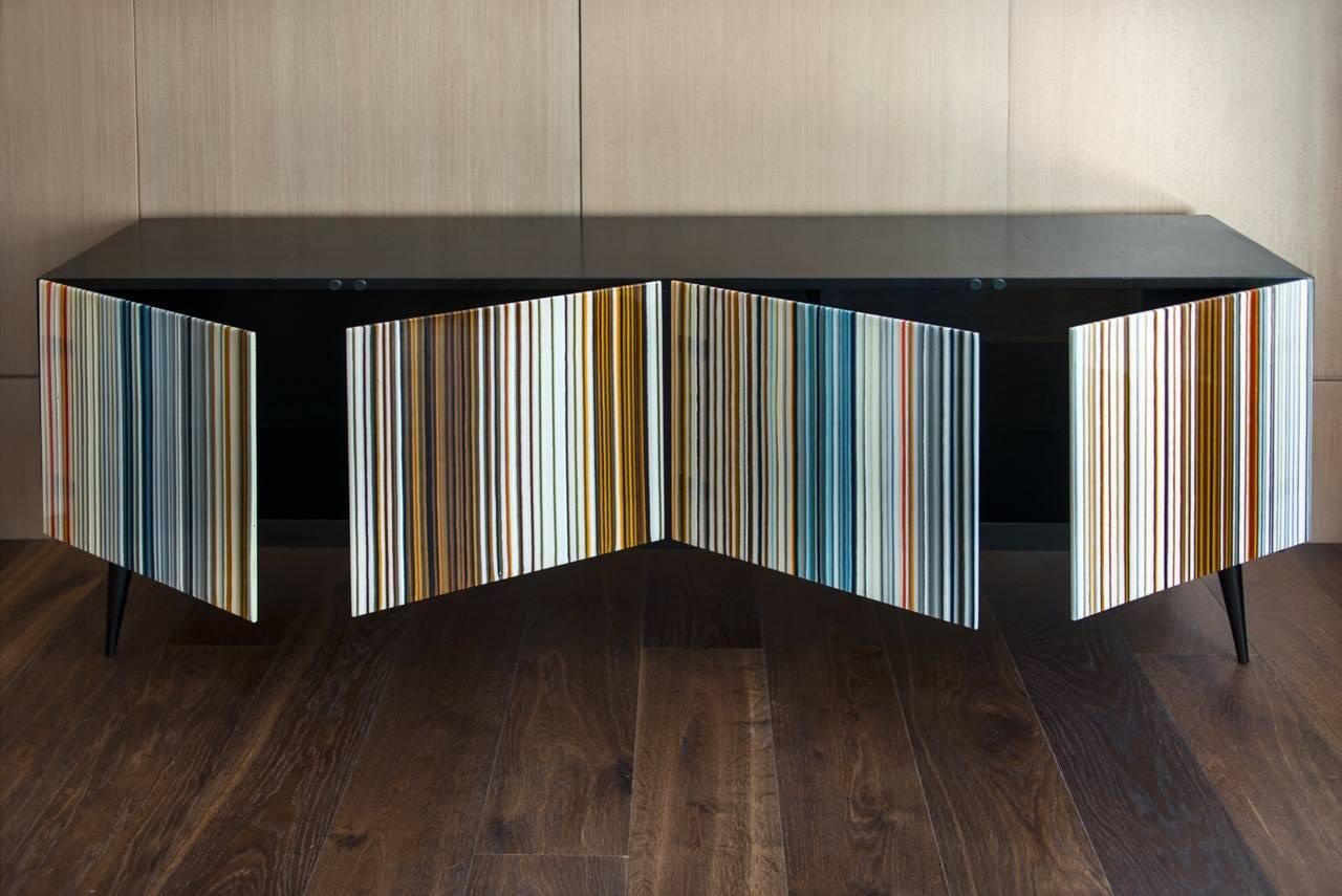 Credenza designed by Orfeo Quagliata in collaboration with Taracea Furniture. An object of fused glass created with the exclusive barcode technique. The Buff-Heyyy´s retro design mixed with designer's exceptional glass expertise put together a