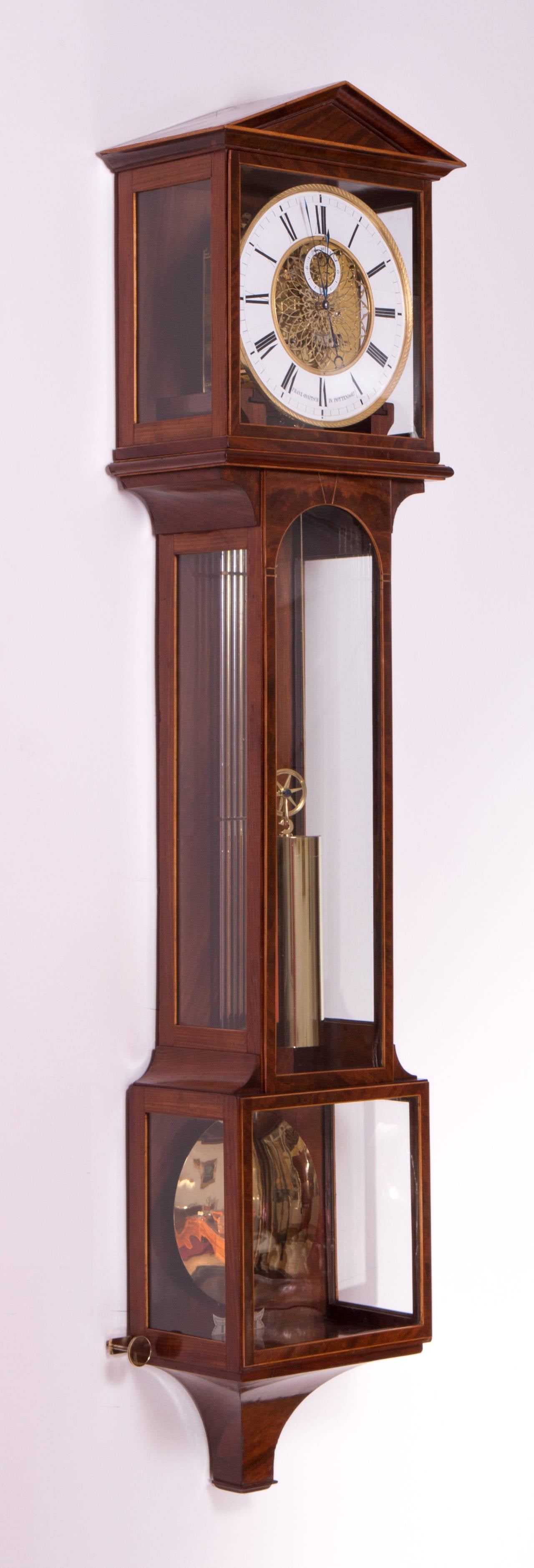 Signed:”Franz Onnitsch in Pottendorf,“ Austria, circa 1830.
Length: 153 cm, width: 30,7 – 19,5 cm – 27,8 cm, depth: 18 – 17 -18 cm, duration: one year.
Mahogany veneered case, enamel chapter ring, enamel seconds ring, the center of the dial is