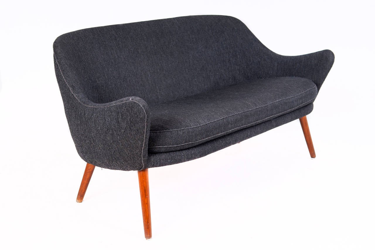 Rare sofa by Hans Olsen.

Materials: Upholstered in wool with beech legs.