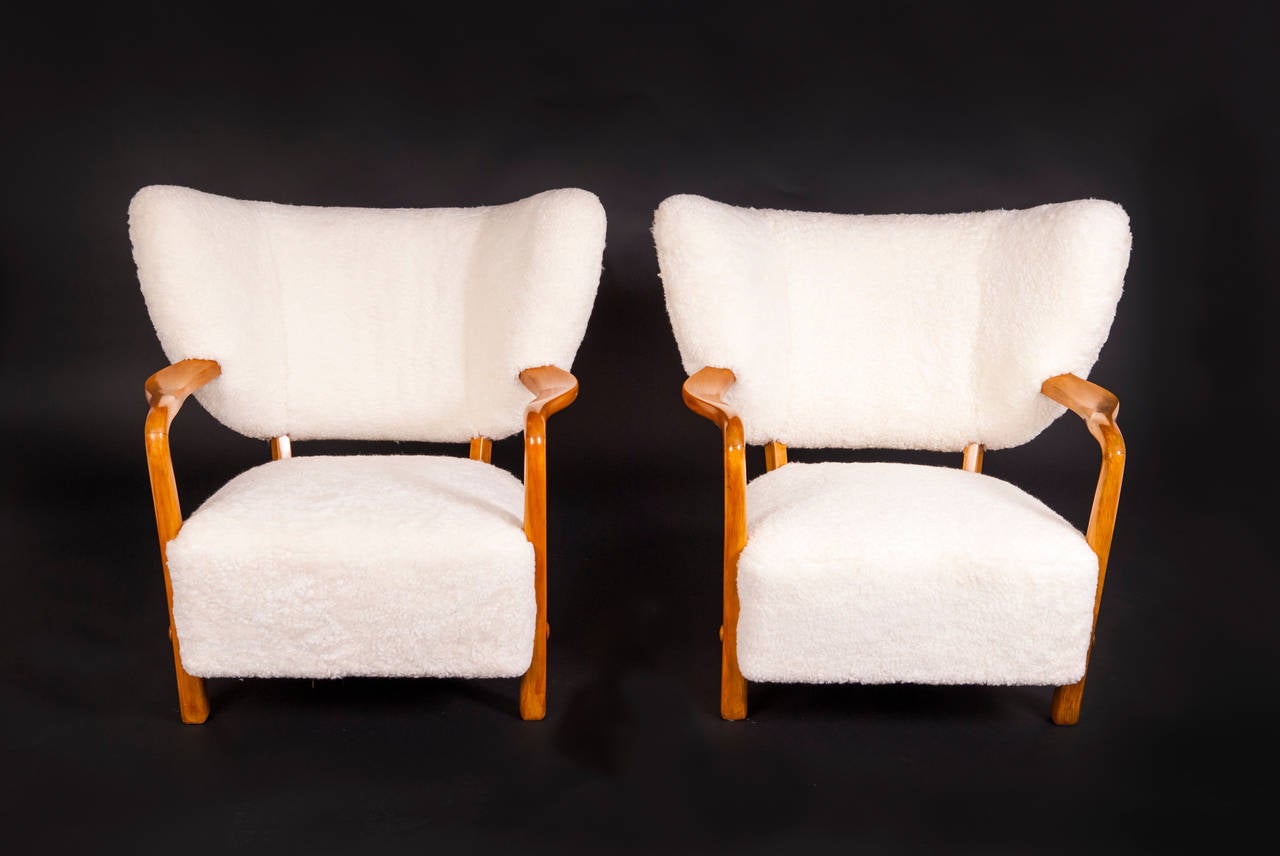 Scandinavian Modern Danish Cabinetmaker Easy Chairs in Sheepskin and Beech, Attributed to Hos Wulff