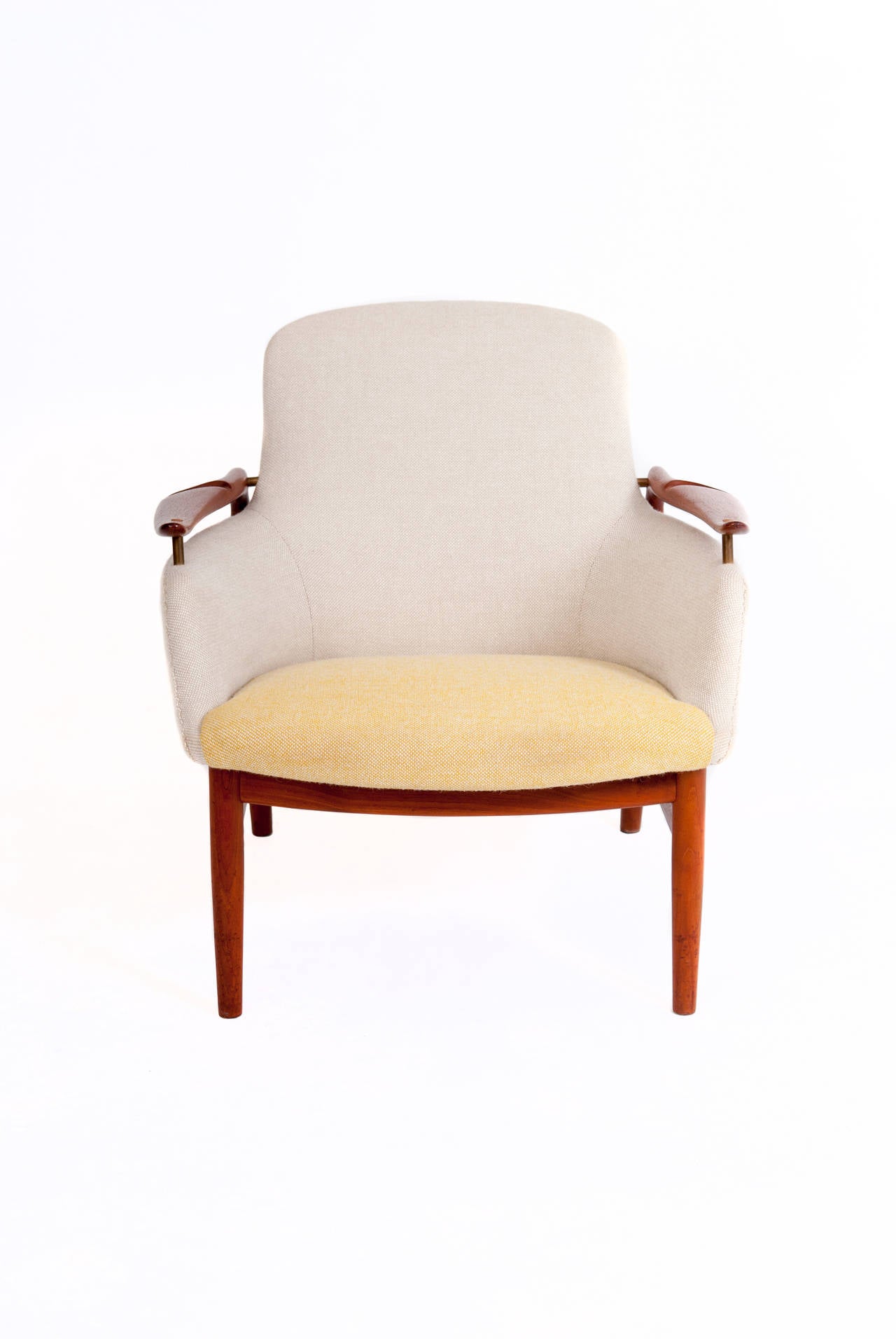 Finn Juhl lounge chair, model NV-53, with teak legs and armrests, upholstered in wool. 

Designed in 1953 for the cabinetmaker guild exhibition.

Stamped by Niels Vodder.