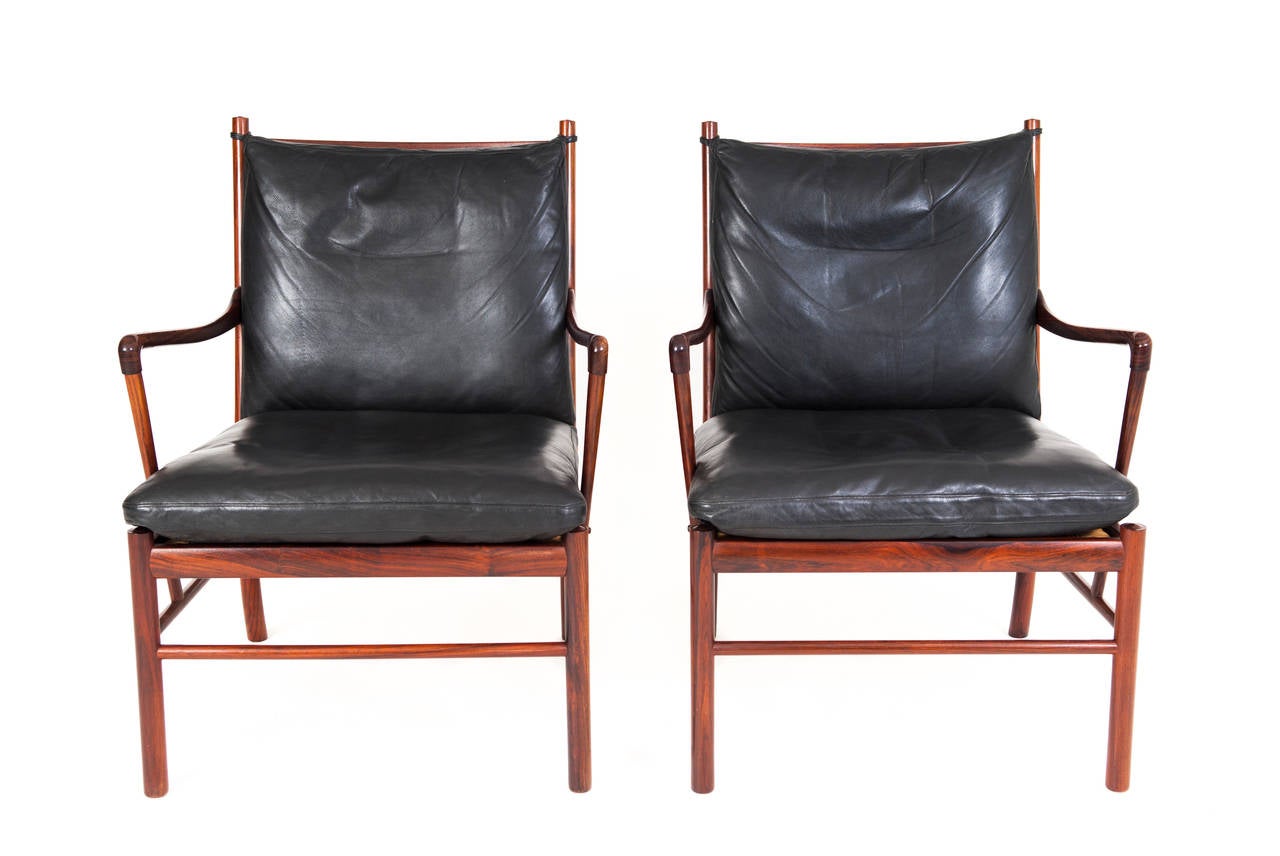 Ole Wanscher. Colonial chairs.

Rosewood. Seats with woven cane, cushions upholstered with original black leather.

Designed 1959.
Model PJ149.
Manufactured by P. Jeppesen, Denmark.