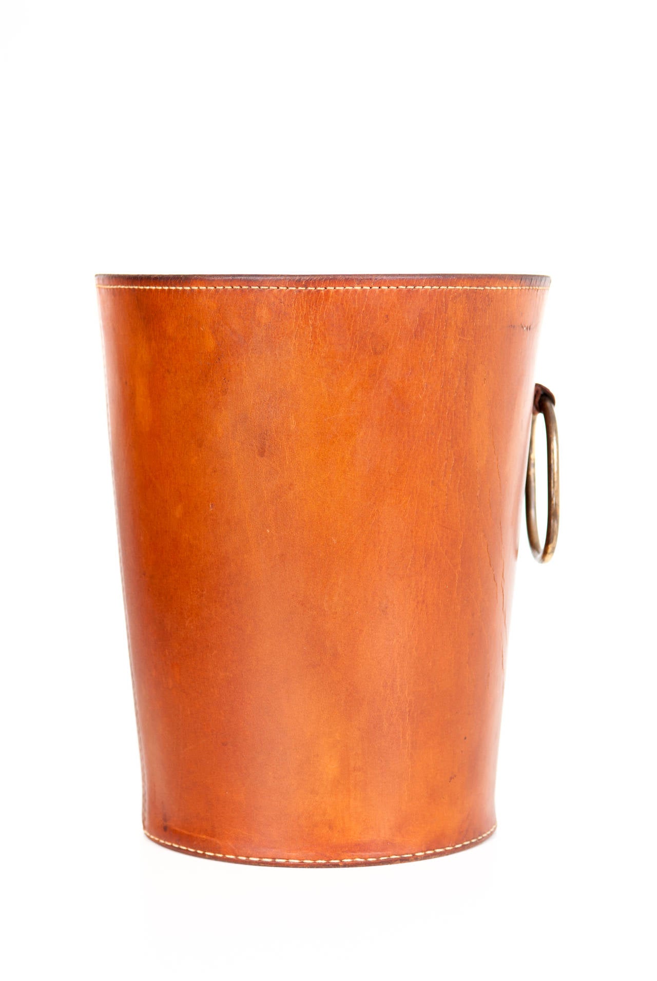 Carl Auböck 

Waste paper bin in original cognac leather from the Vienna based workshop

ca 1950