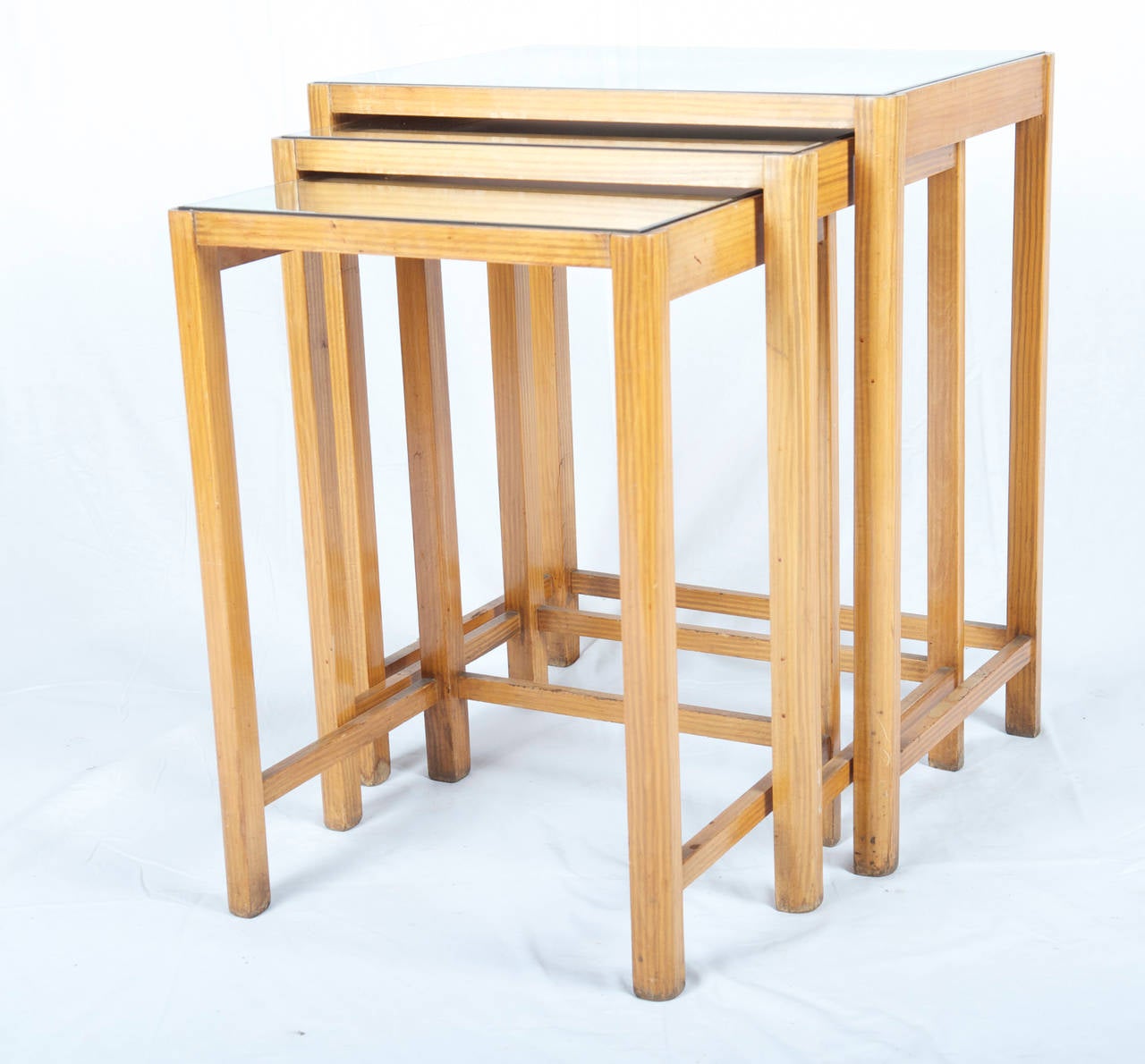 Set of Thonet nesting tables with mirror tabletop 
original condition.