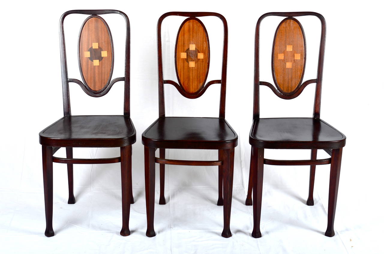 Thonet no. 414 an inlaid stained bentwood chairs 
MARCEL KAMMERER FOR THONET 
97 cm. high 
Branded mark THONET and remnants of paper label