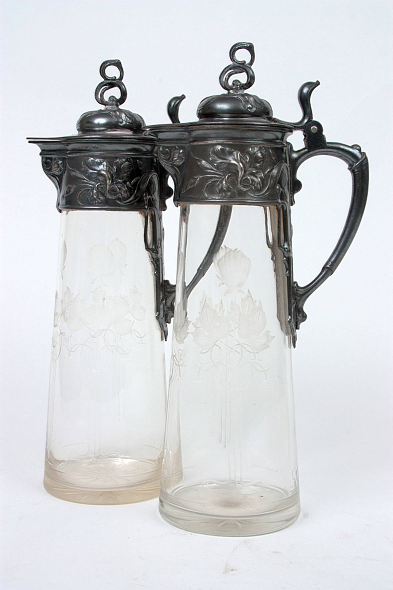 Pair of Art Nouveau WMF carafes or Pitchers 
Germany about 1900 - 1910

Thick glass, polished and engraved.
High: 33cm (12.64in)