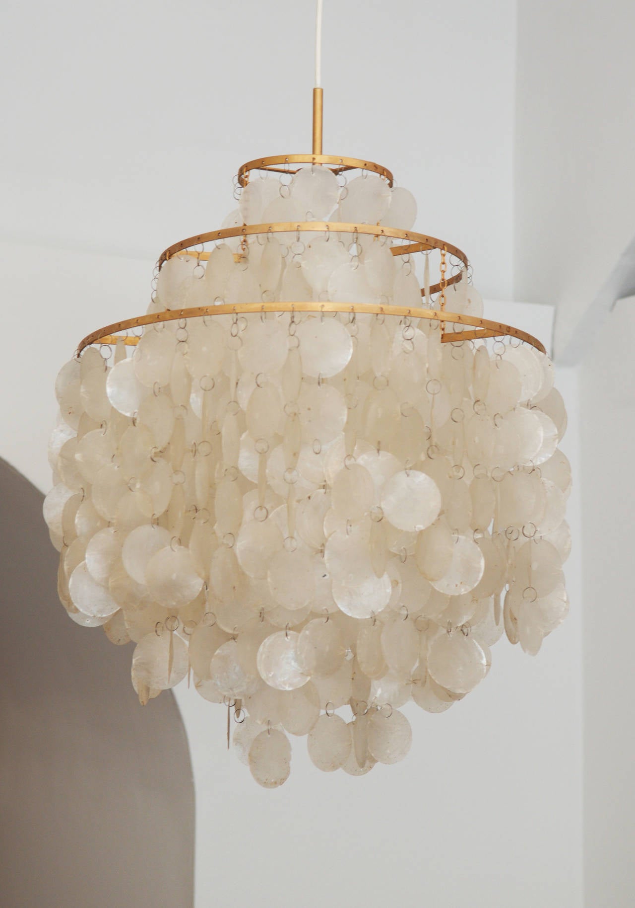 Capiz shell chandeliers from about 1960s designed by Verner Panton.

the length is about two meters and the cable can be shorten.